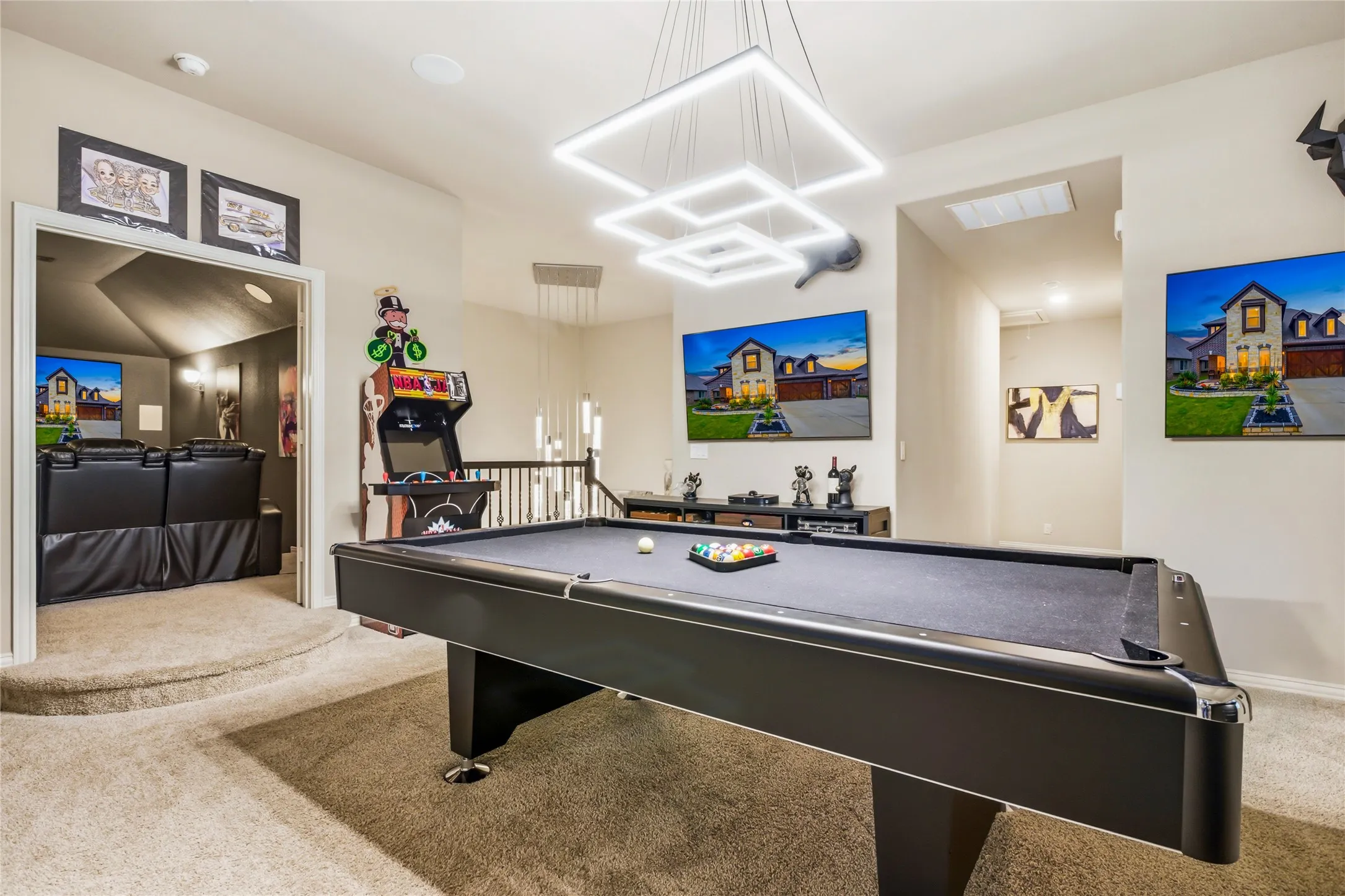 The game room is located upstairs next to the media room