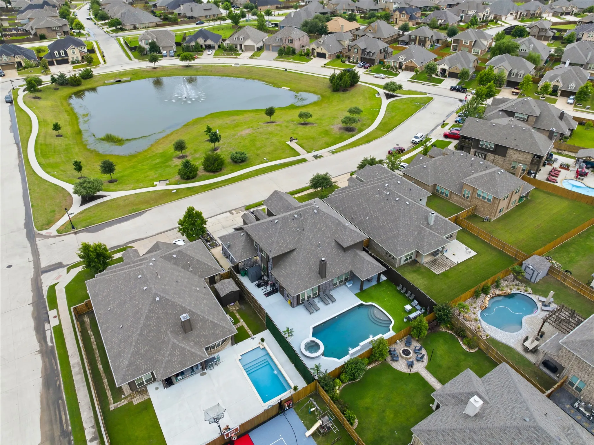 The home is situated directly across from an pond and walking trail.