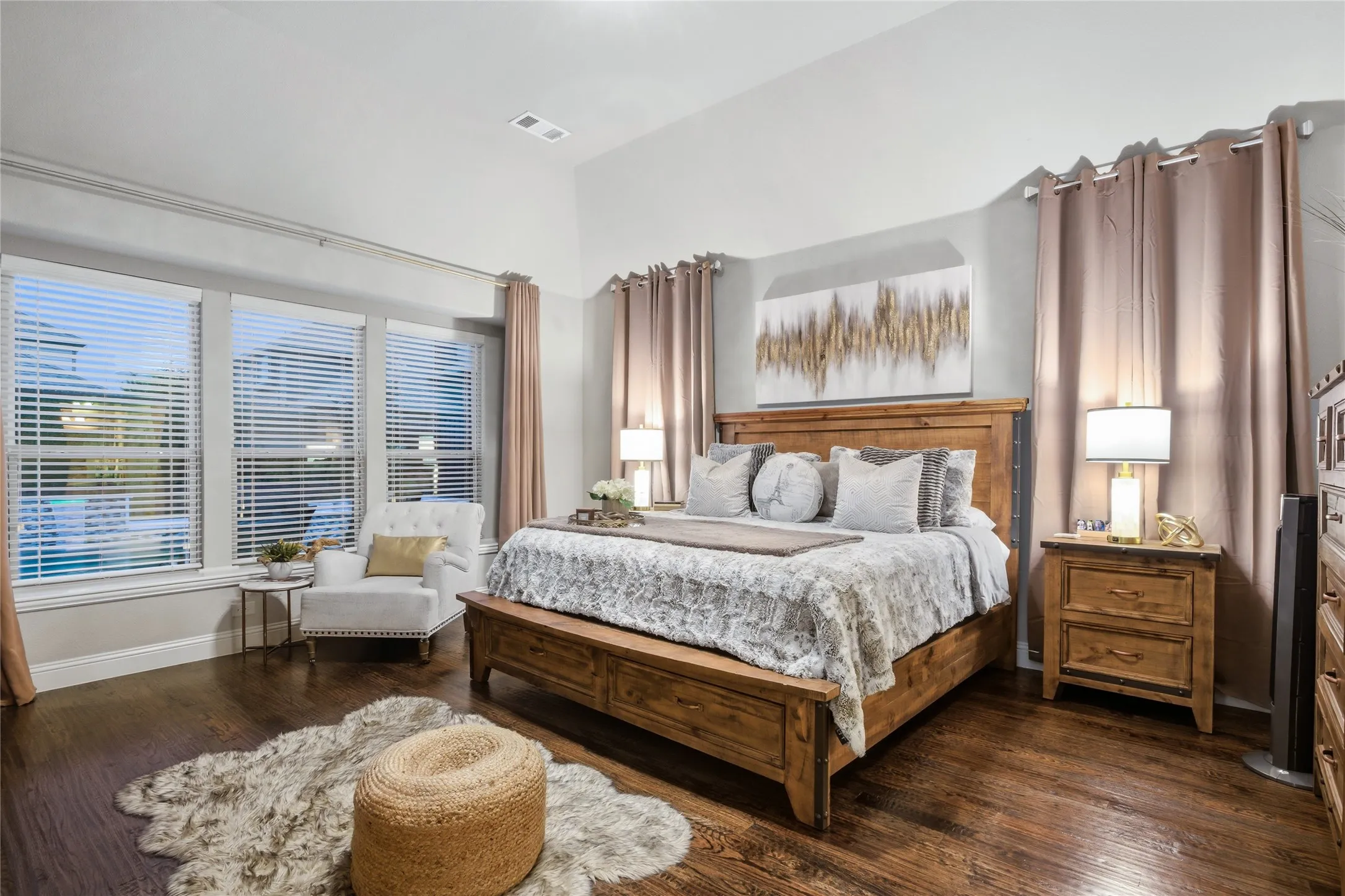 The Primary bedroom has a view of the backyard pool.