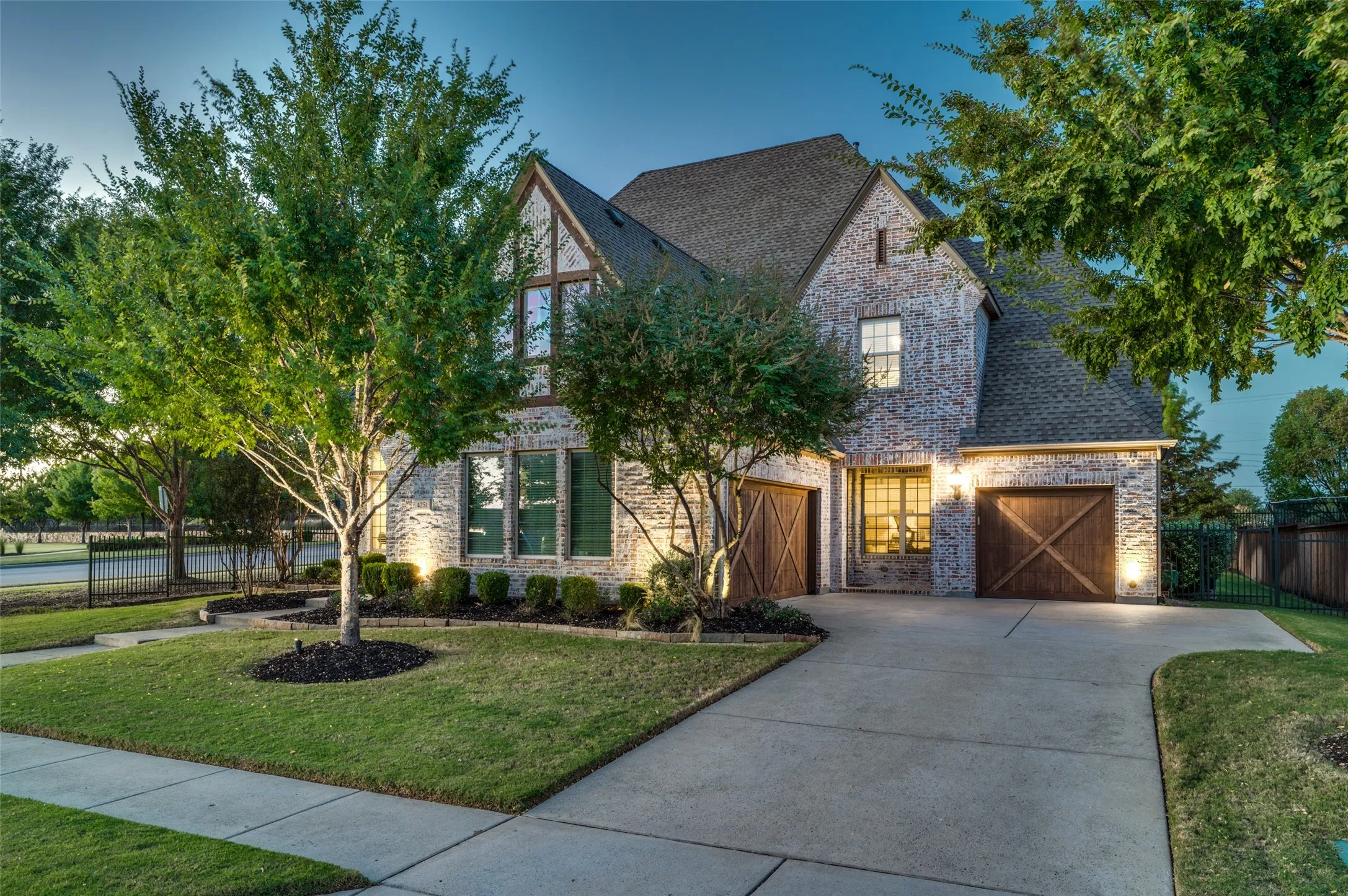 Front of home, view of 3-car garage