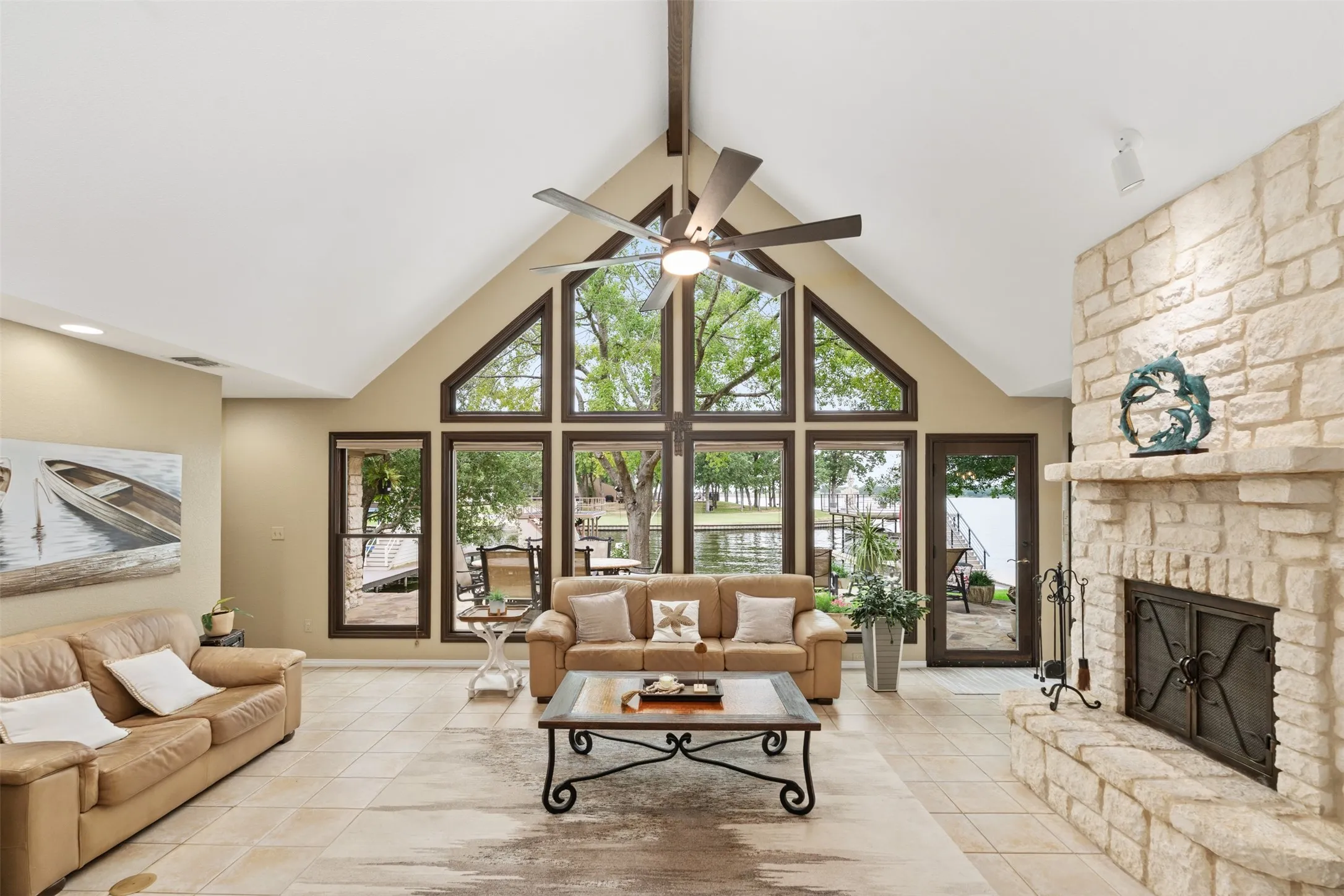 Vaulted ceiling featuring exposed wood beams
