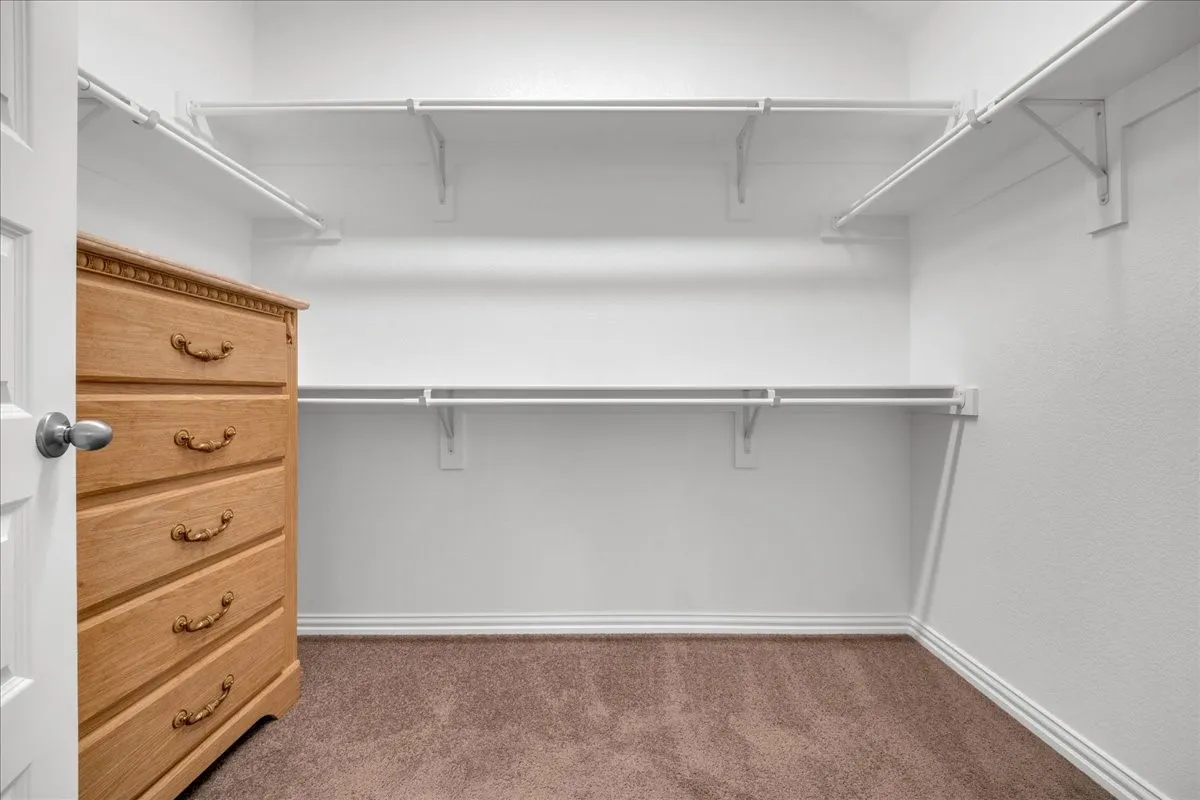 spacious walk-in closet in Primary