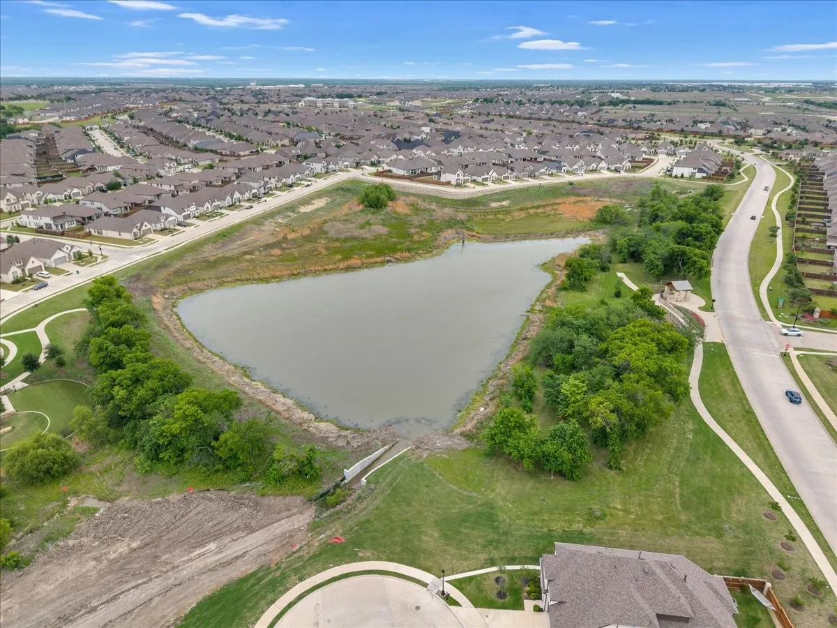 Pond in subdivision with walking paths