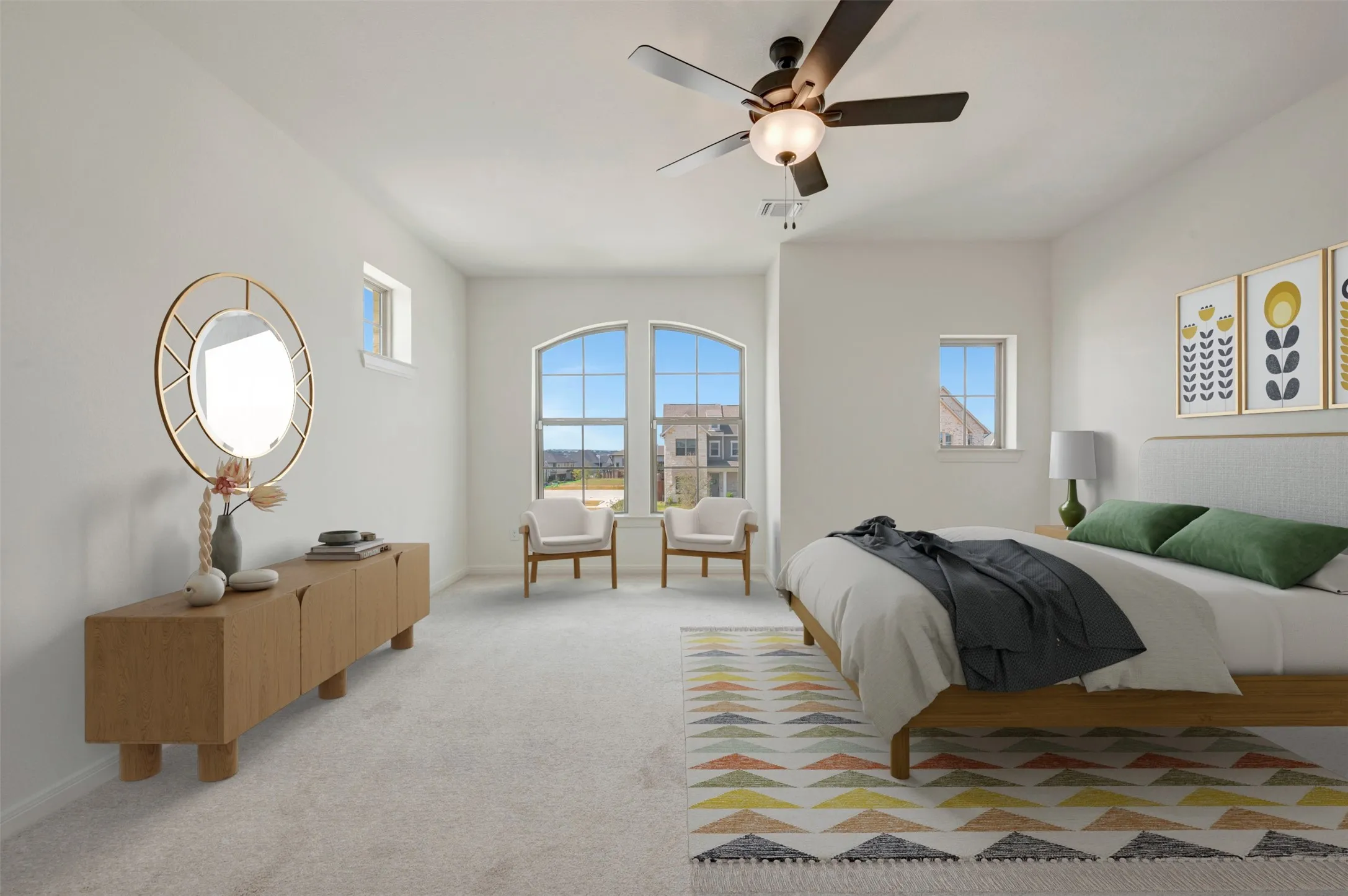 Arched windows, recessed lighting, and a ceiling fan with integrated light fixture