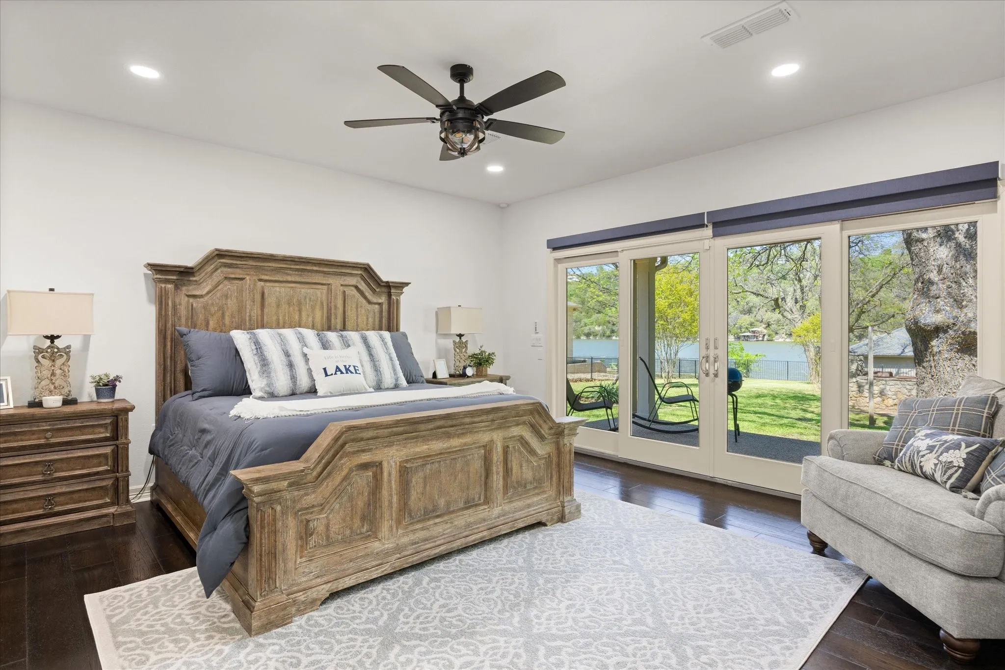 Bedroom featuring dark wood-finish flooring and white walls
