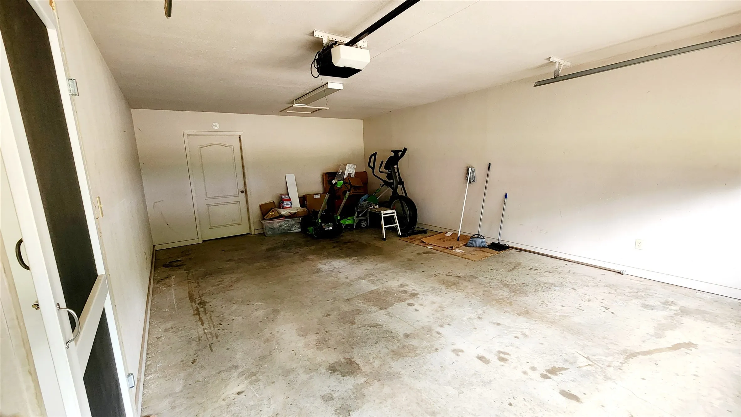 Large storage room at back of garage