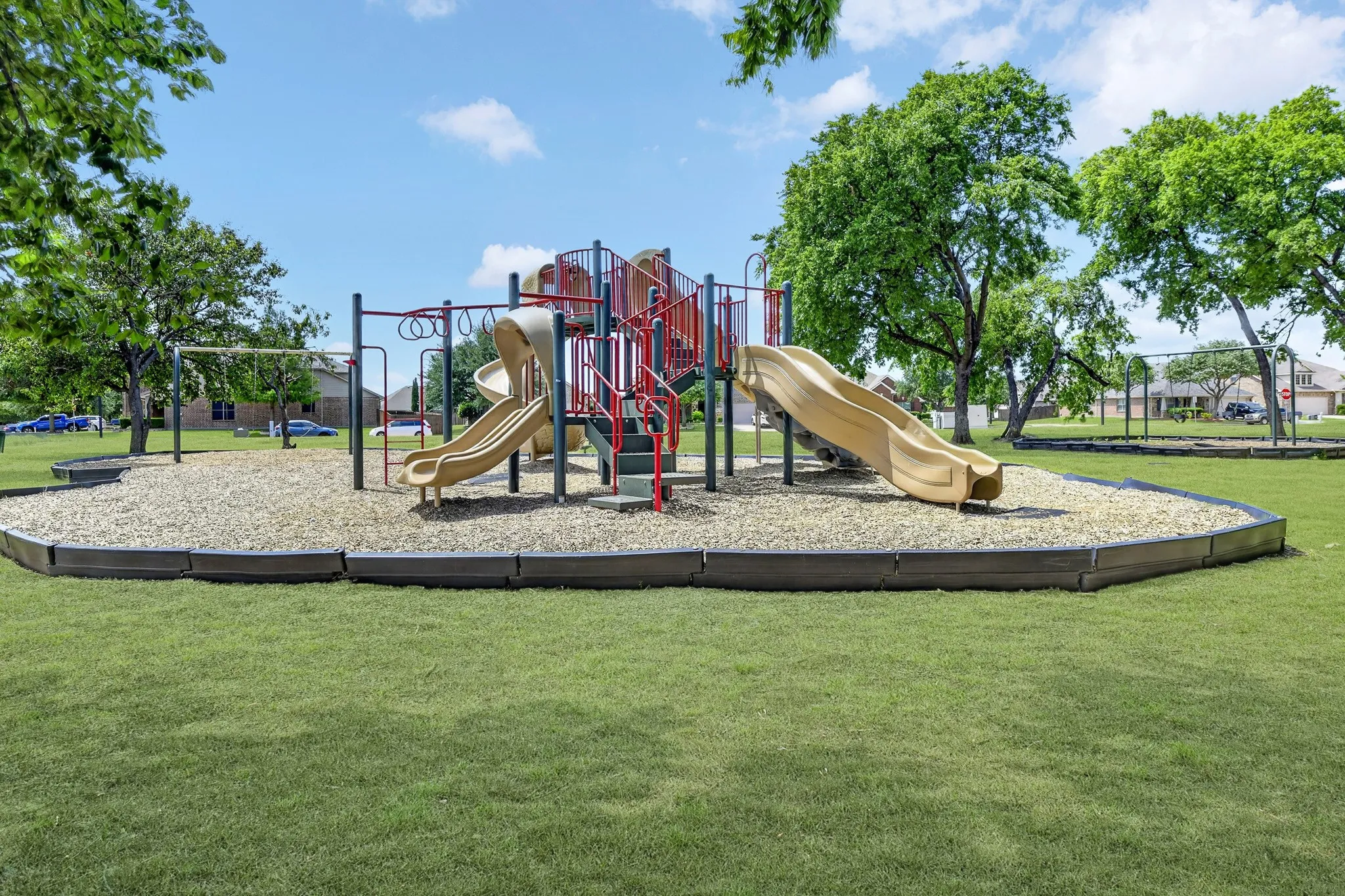 One of several community playground areas in the neighborhood