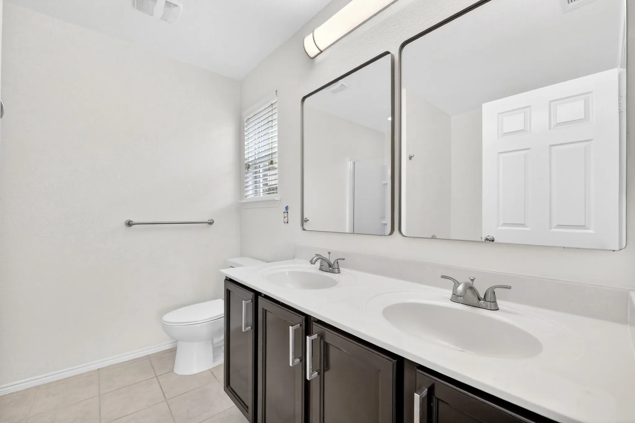 Primary bathroom with dual sinks
