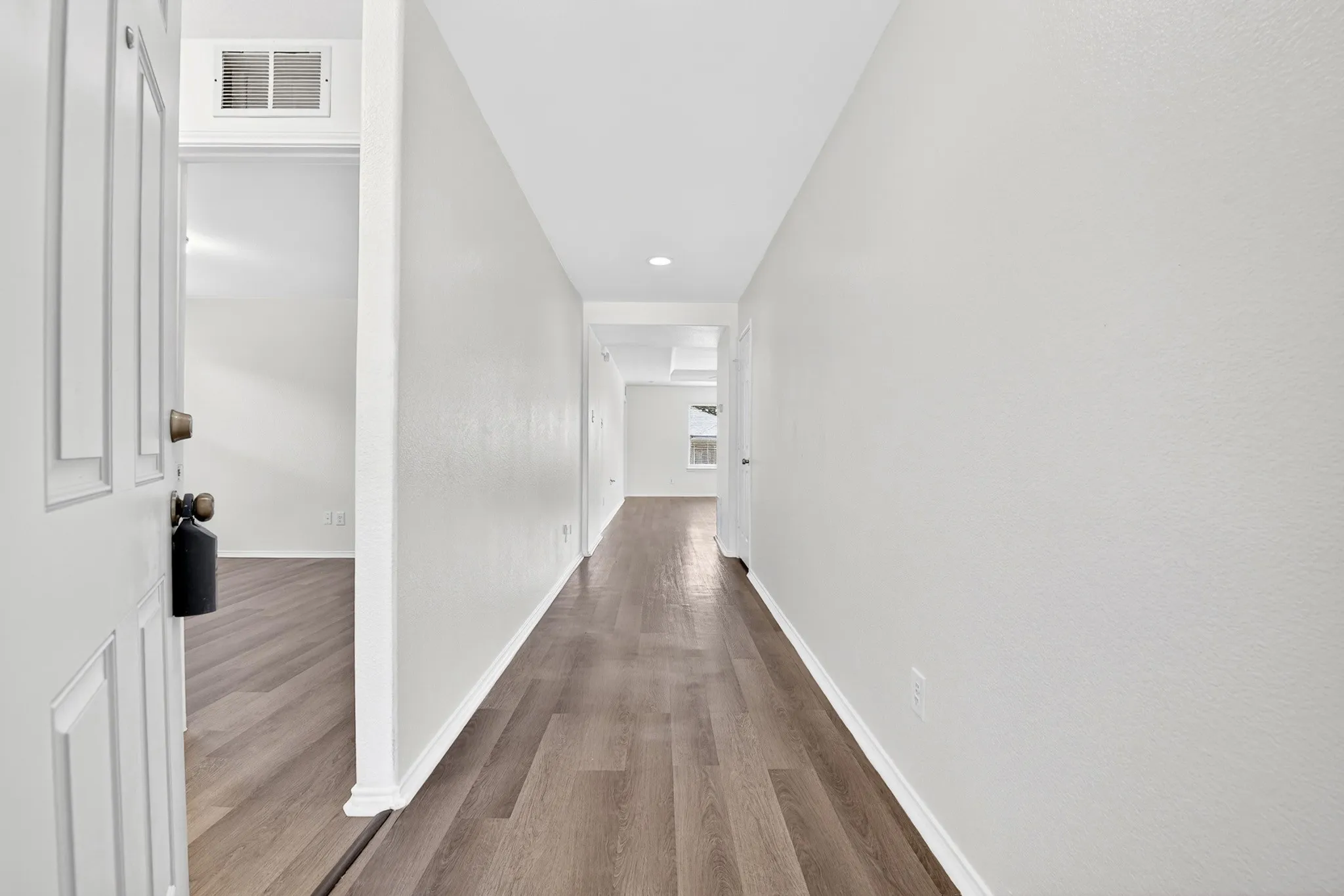 As you enter this updated home you are greeted with brand new LVP flooring and freshly painted home!