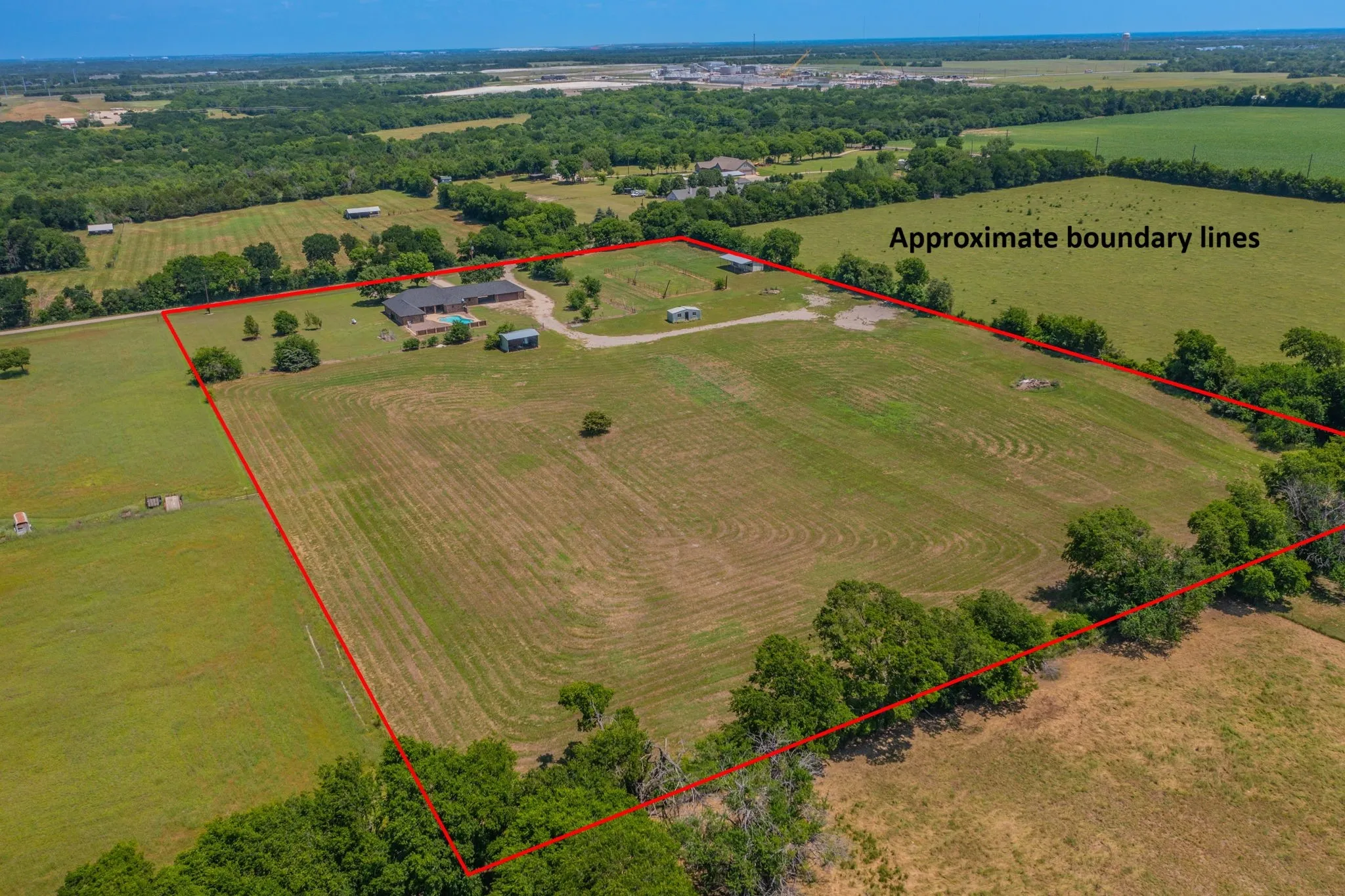 Amazing 10 acre property in New Hope with house, pool, horse stalls, corral, storage barns!