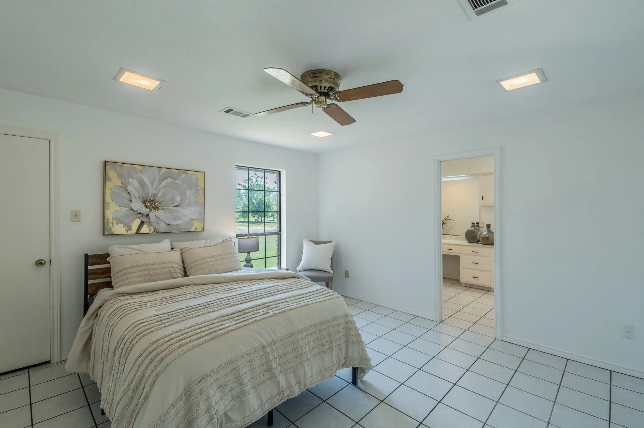Spacious primary bedroom with ensuite bath.