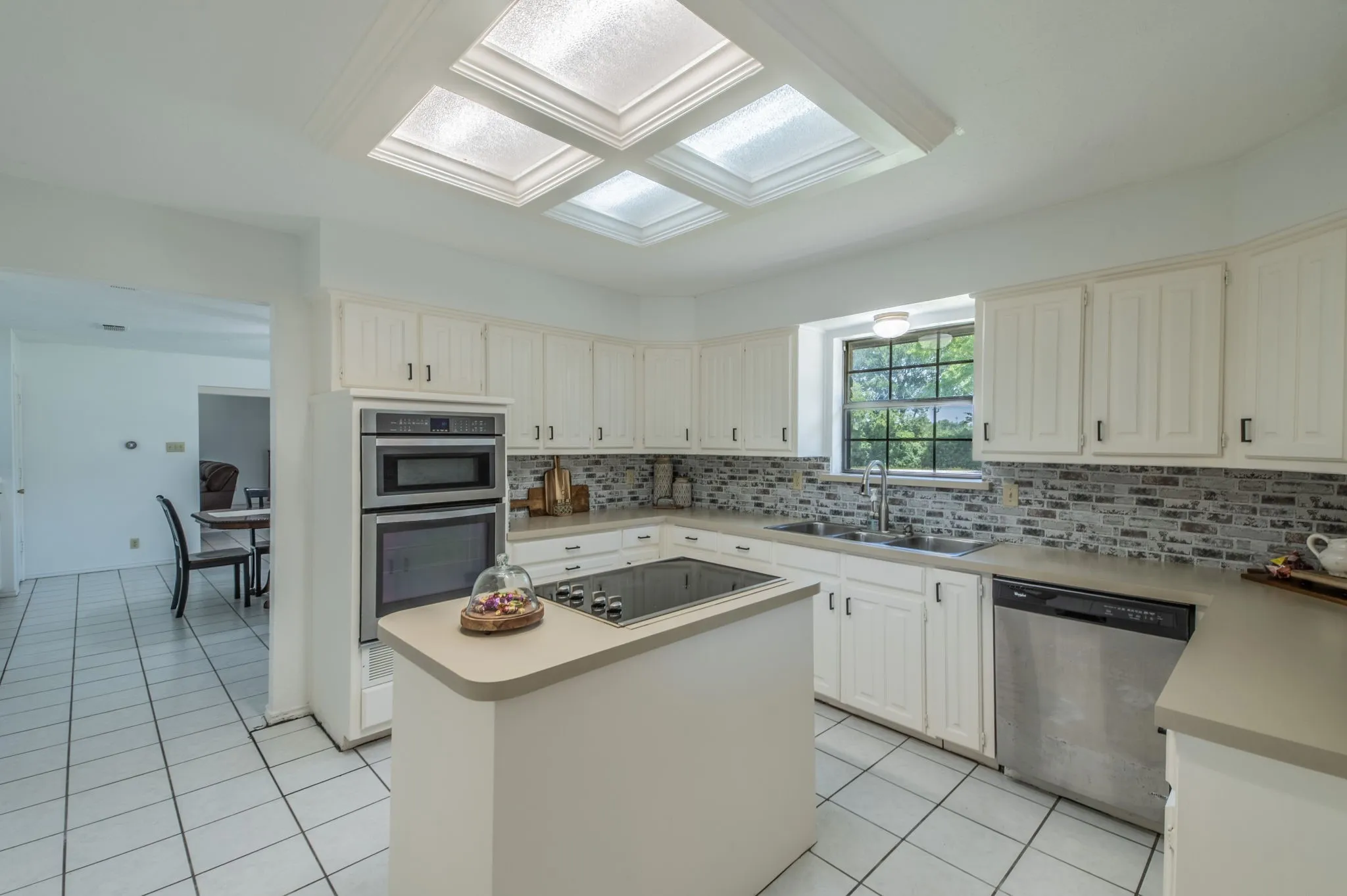 Another view of the cute kitchen facing the dining room.