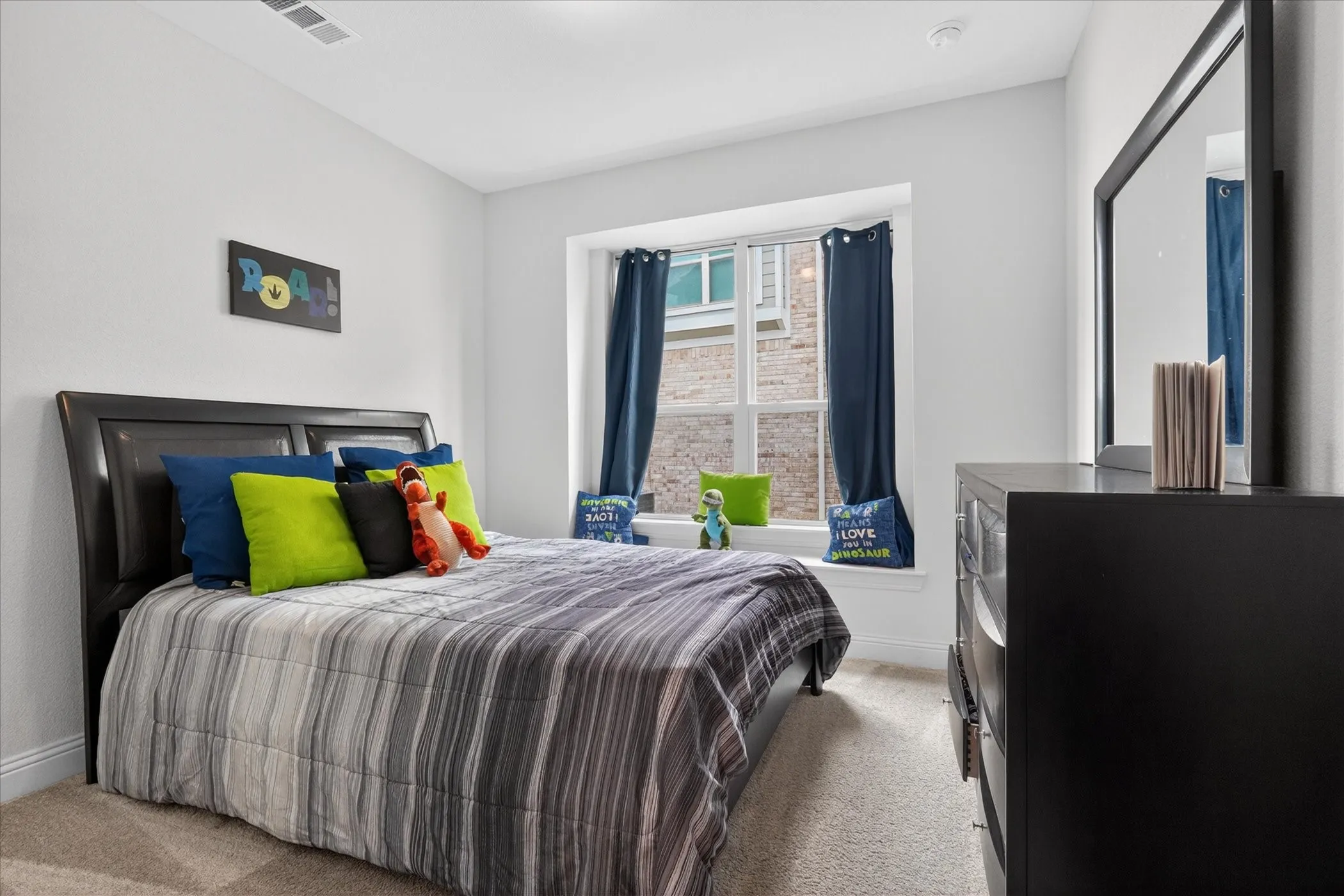 Bedroom featuring a window seat