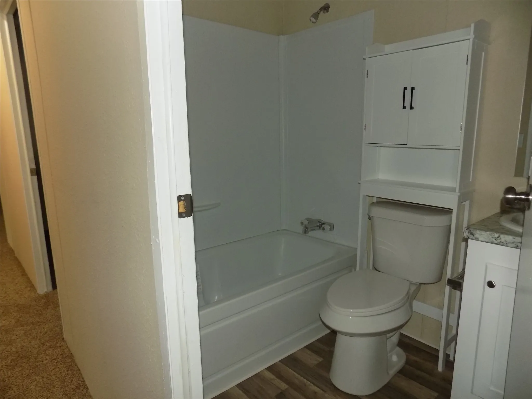New bathtub in guest bath.