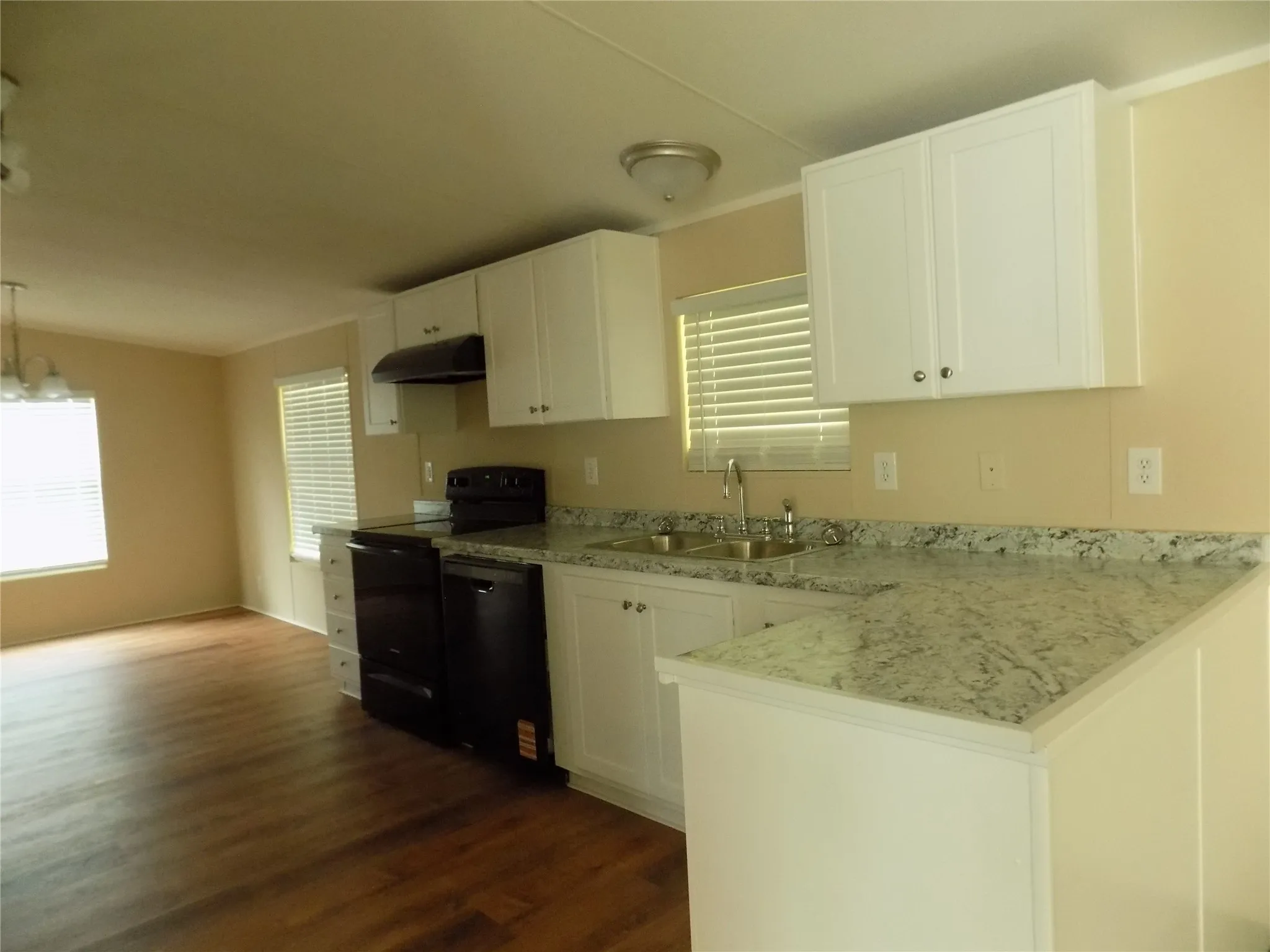 Over view of kitchen area with eat-in room.