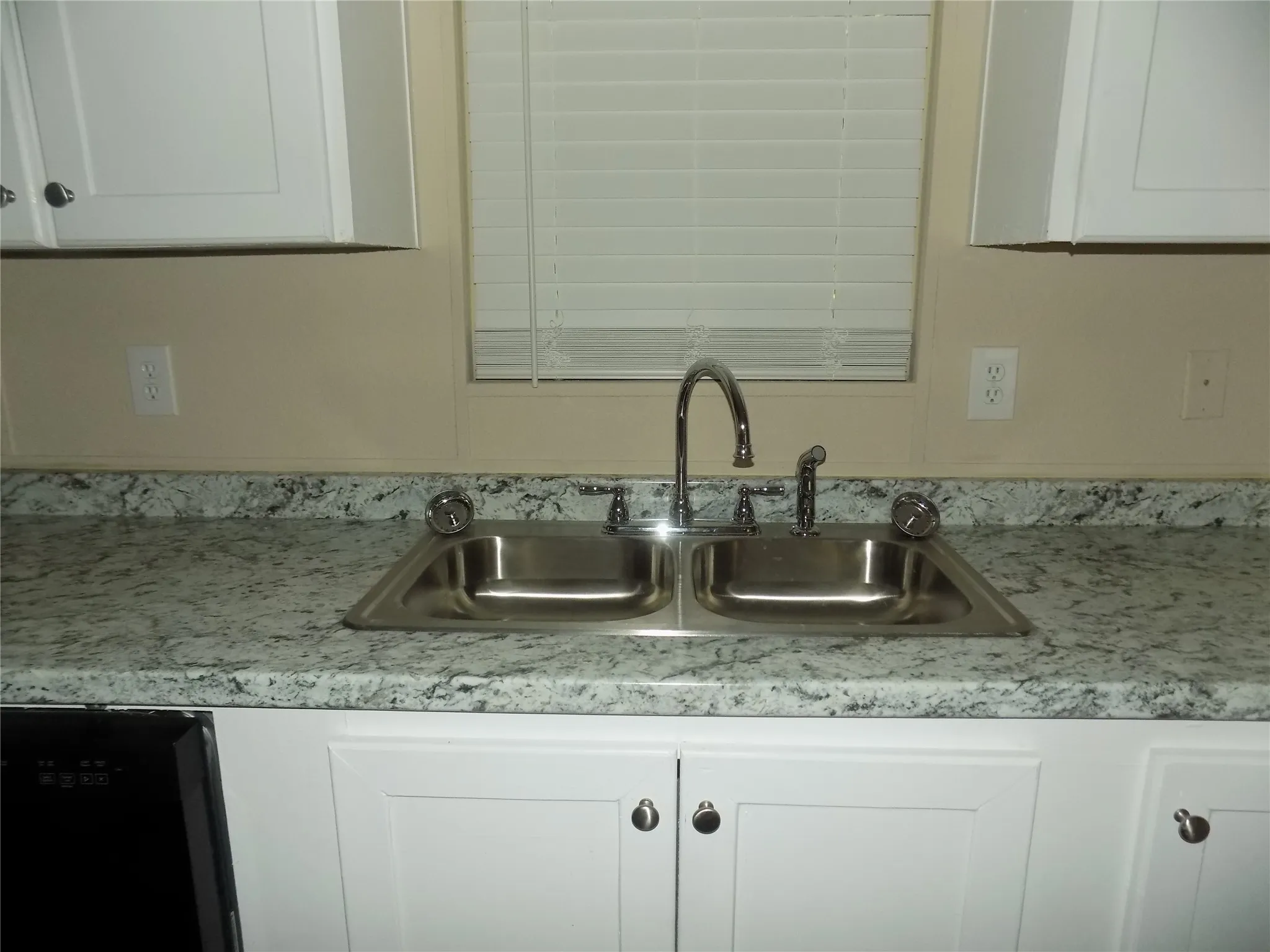 New dual stainless sink and faucets.