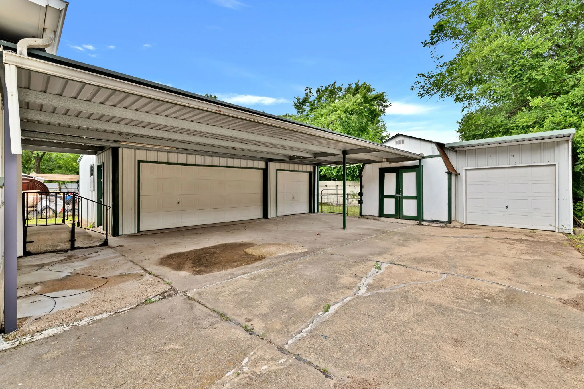 Carport structure providing covered parking or storage