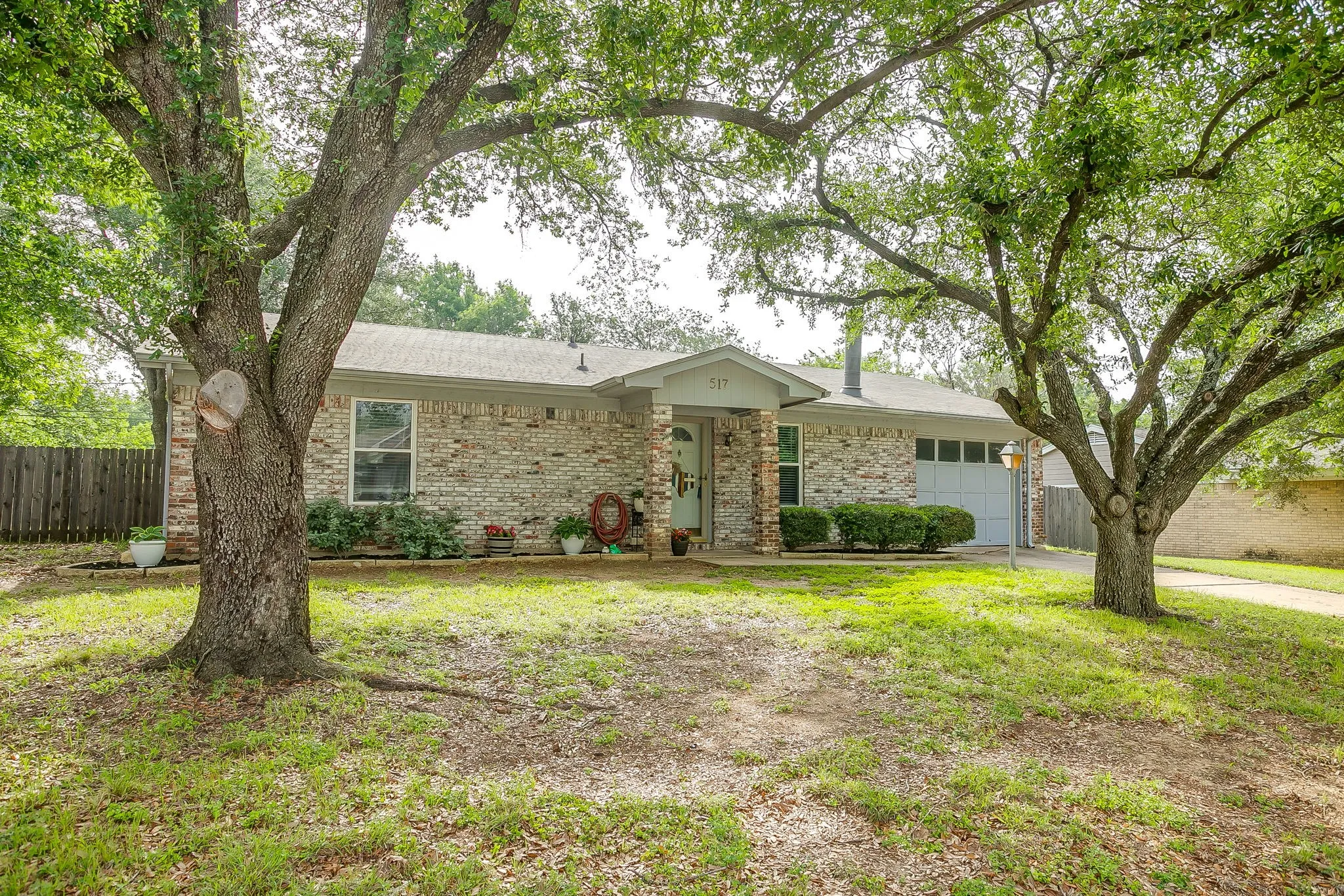 Treed lot in front and back yard