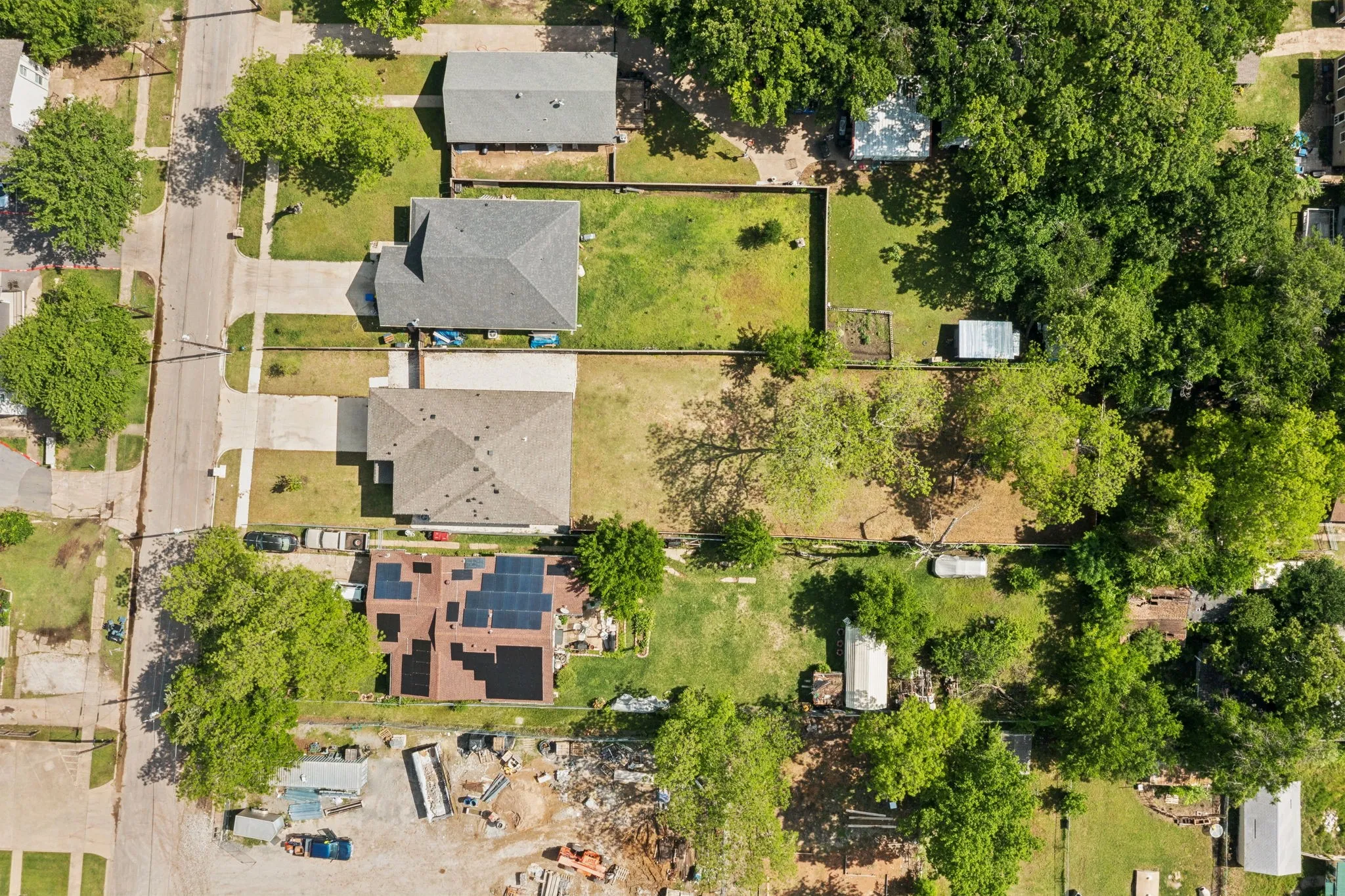 Extended lot with mature trees.