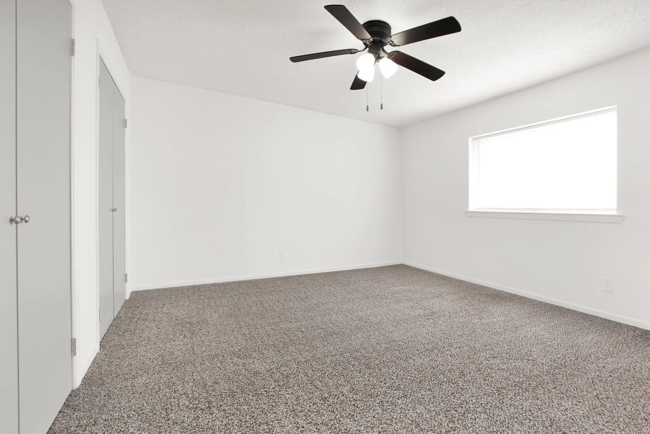 Upstairs north bedroom with double closets