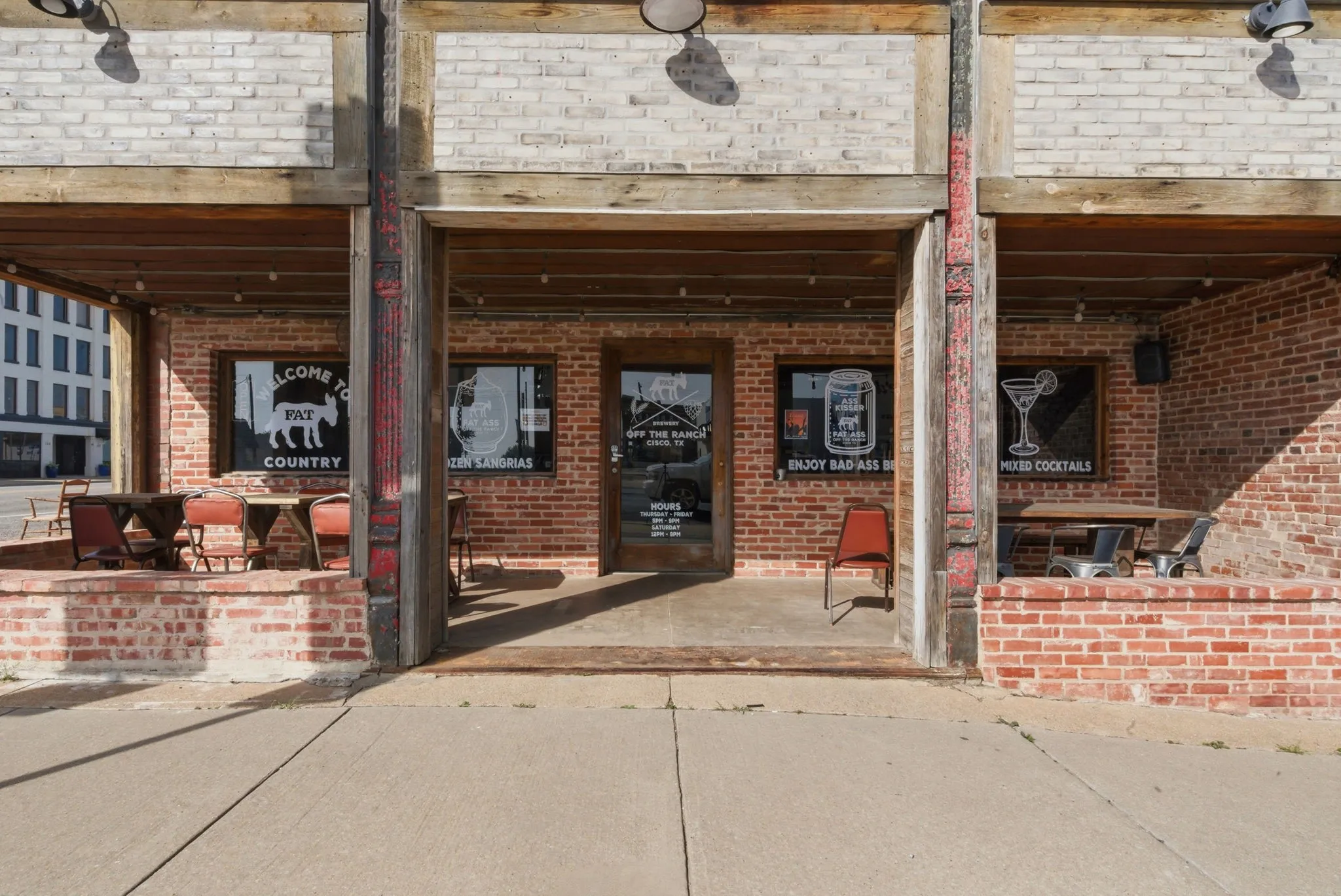 A welcoming entrance with room for tables and chairs outside