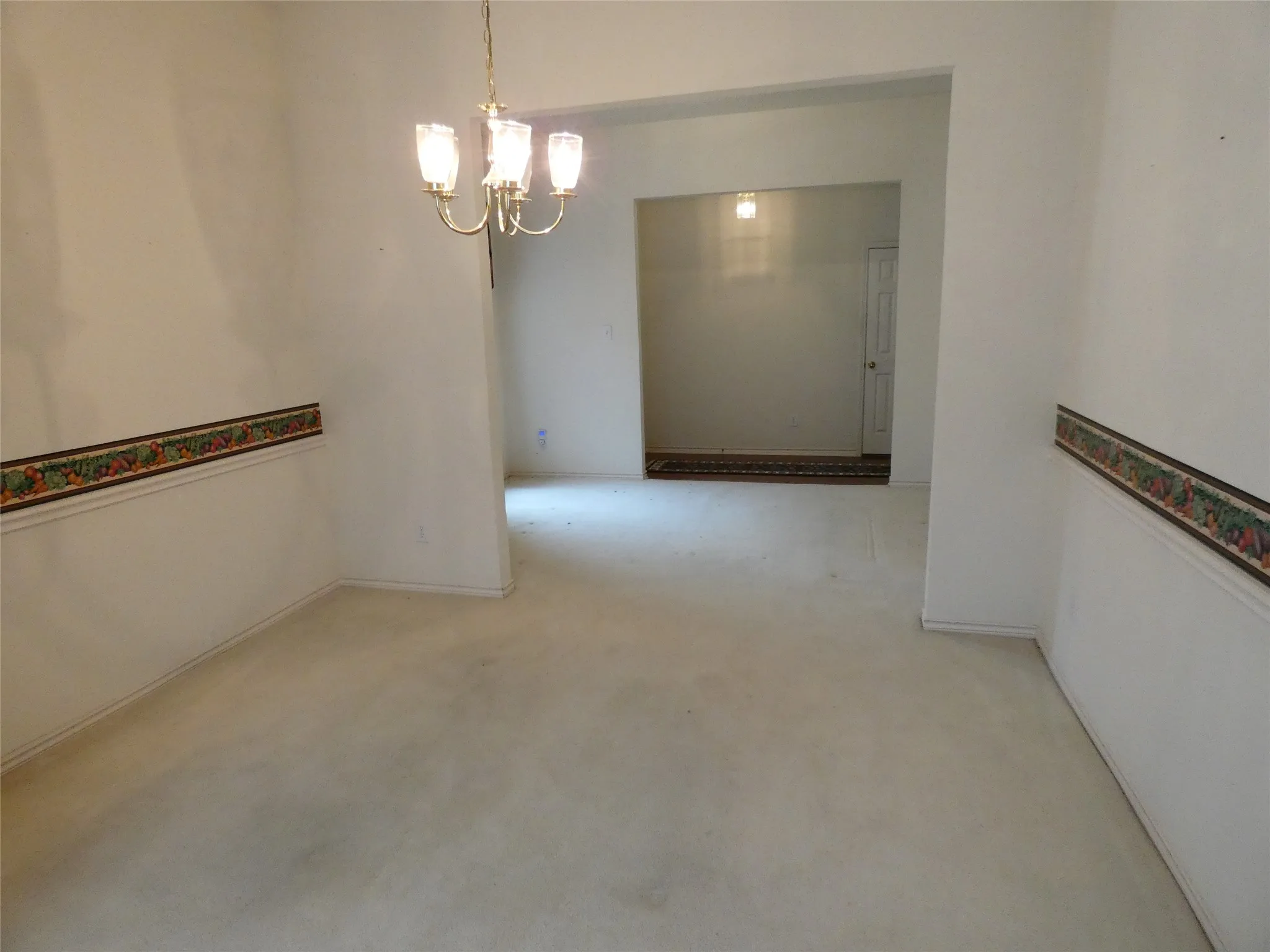 Another view of formal dining and living / entry foyer