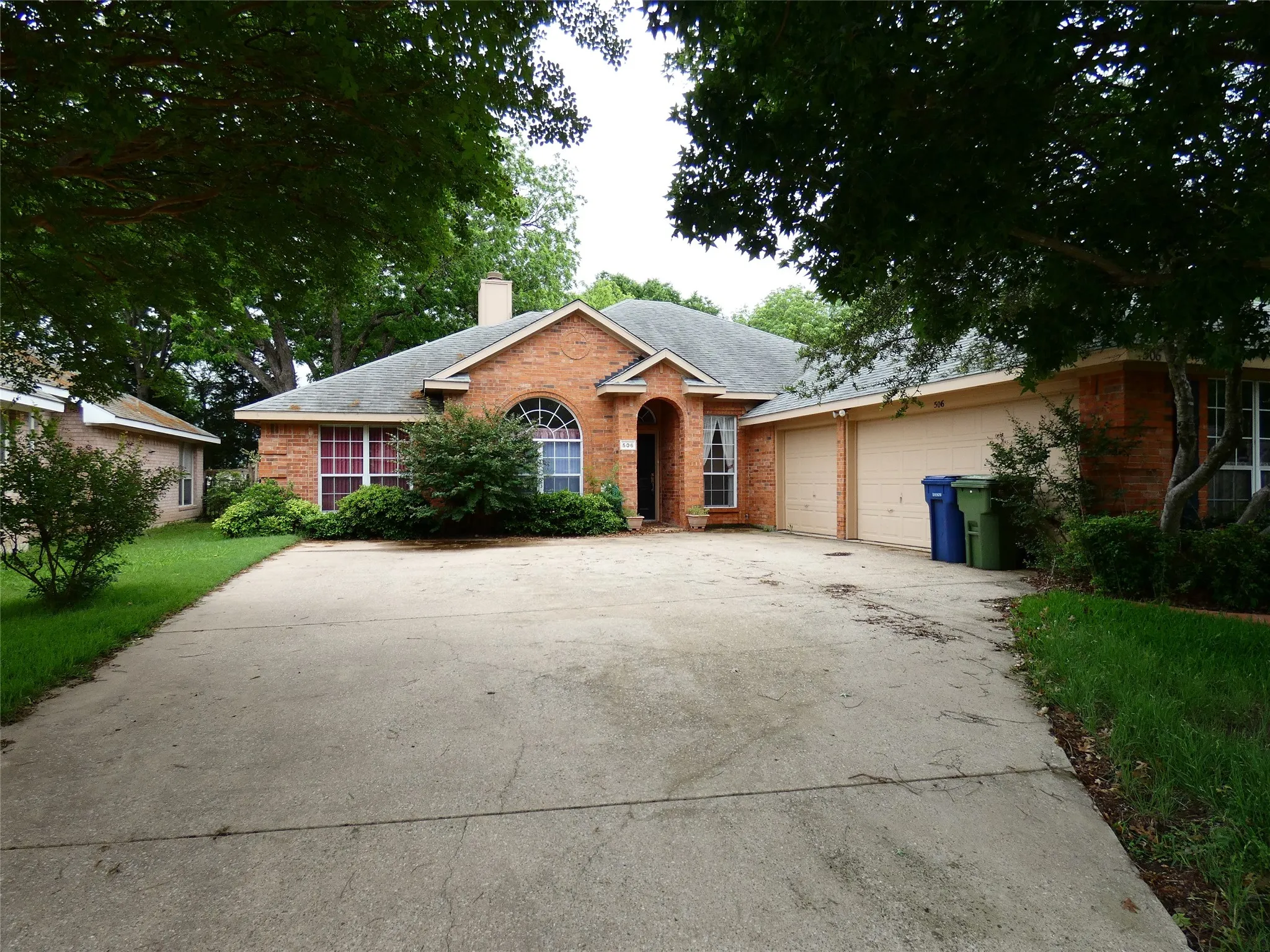 Front of house before new roof installation