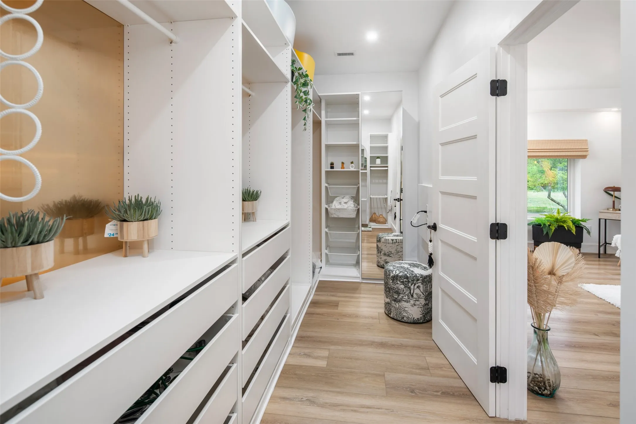 Custom walk-in closet organizes your lifestyle