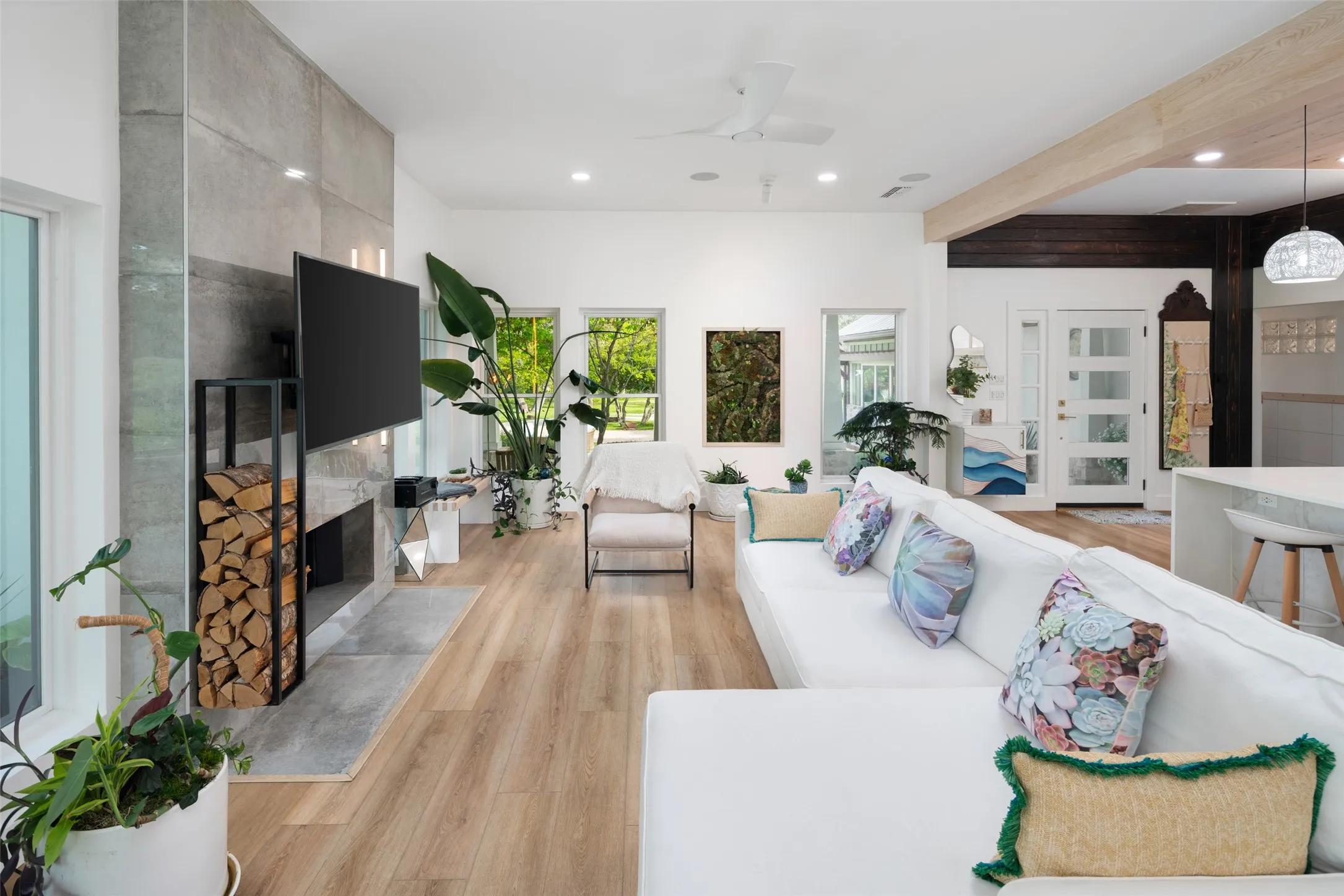Open living with wood burning fireplace