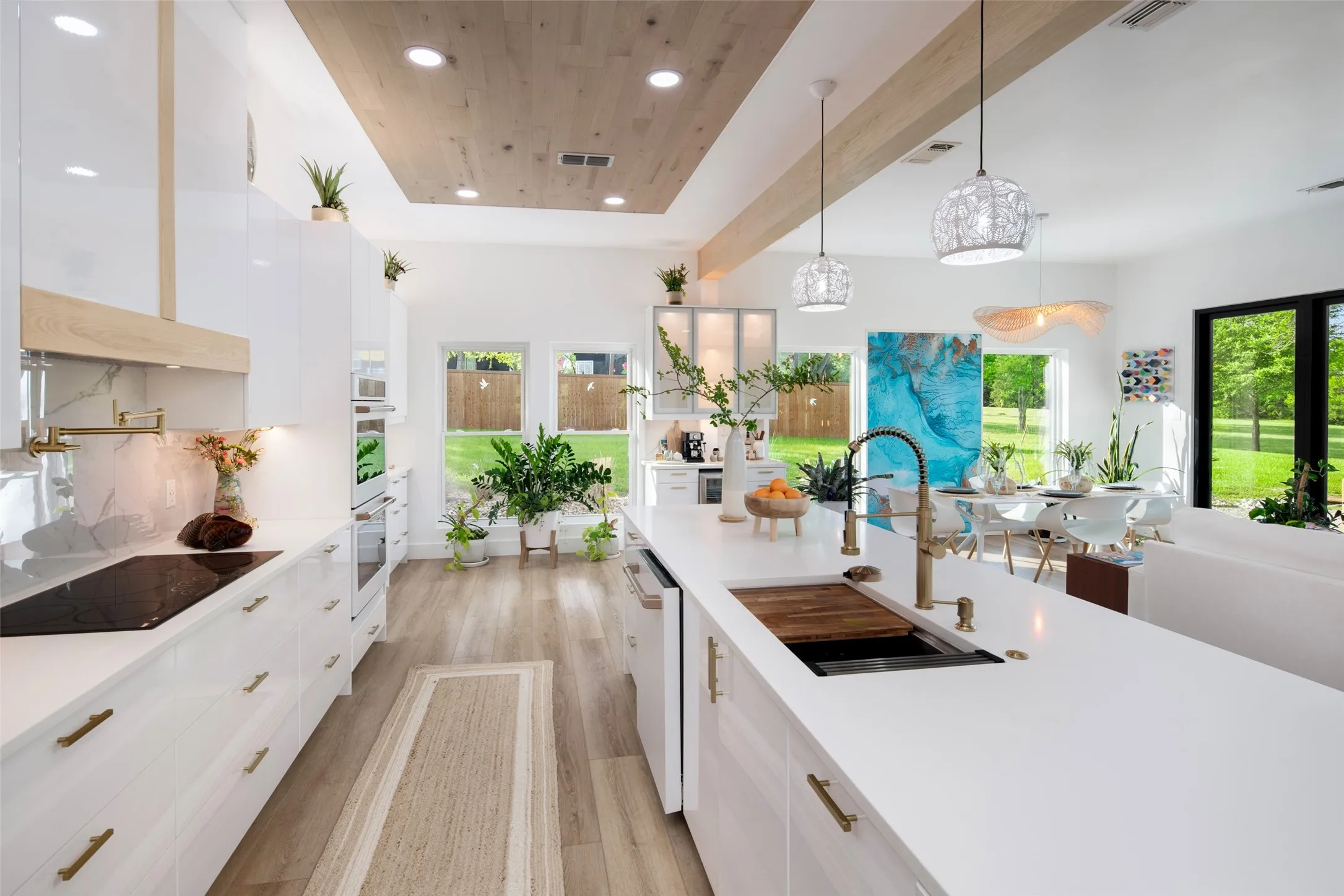 Kitchen features GE Café suite of appliances