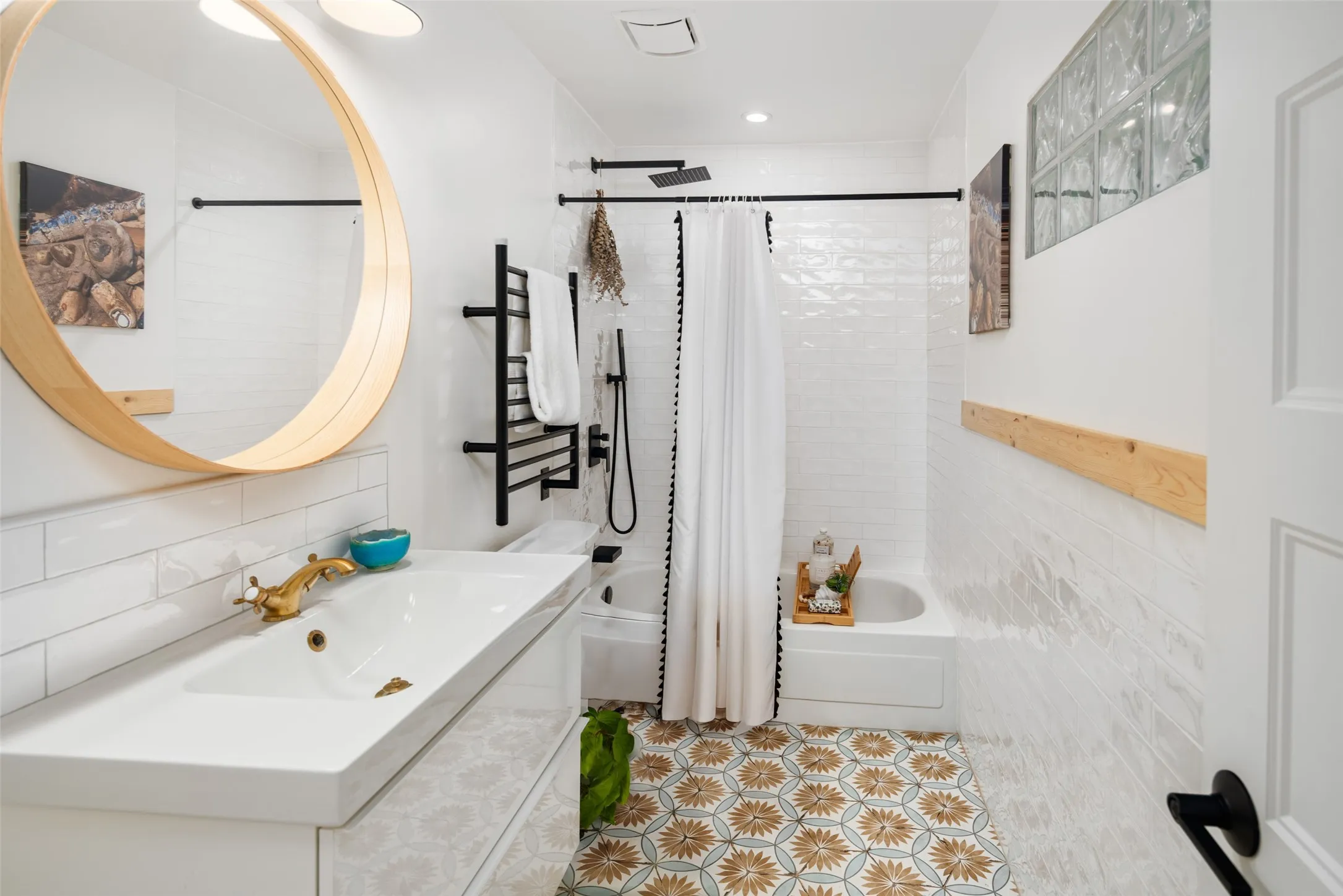 Shared guest bath connects two of the bedrooms