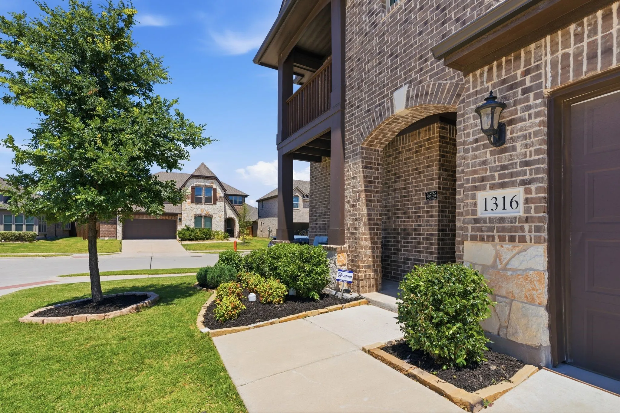 Beautiful curb appeal at your new home at 1316 Tree Shadow Ln
