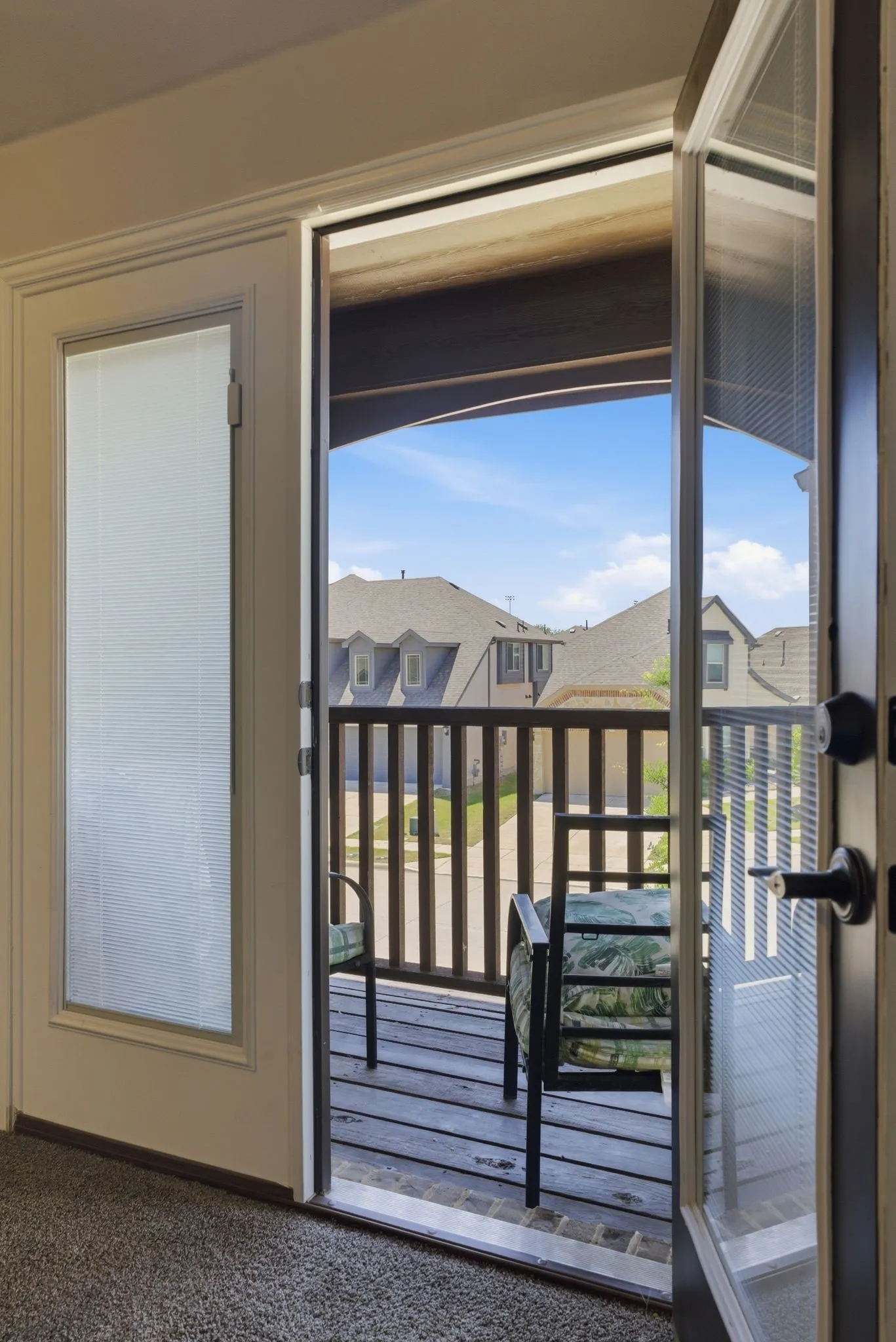 This exits to the upstairs balcony from the game room.  Enjoy a nice spot for a drink!