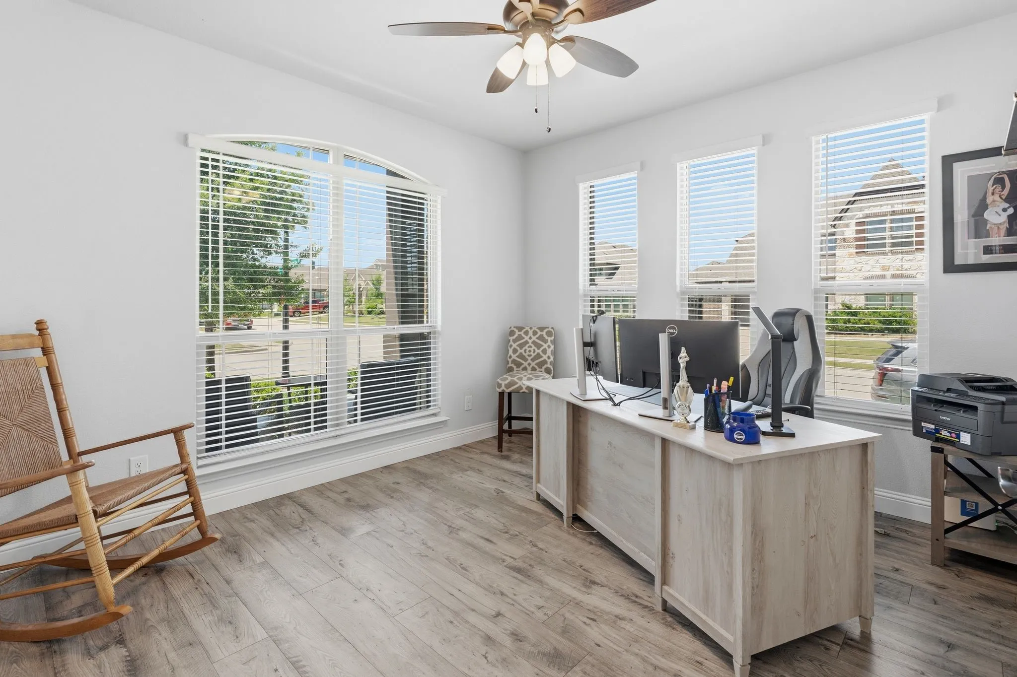 This room overlooking the front and side of the home is perfect for a home office.  Away from the living space of the downstairs kitchen and living room.  Private and spacious