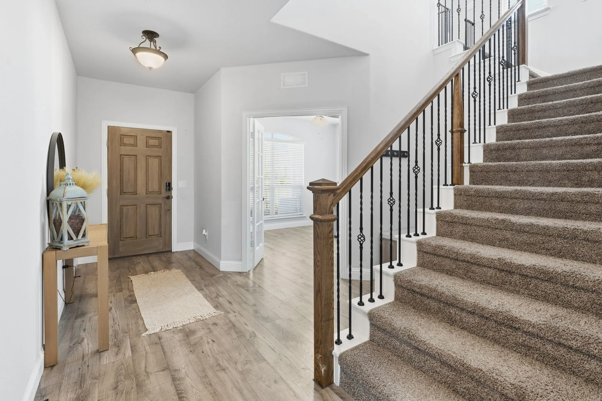 Looking back to the entry and the front office of the home.