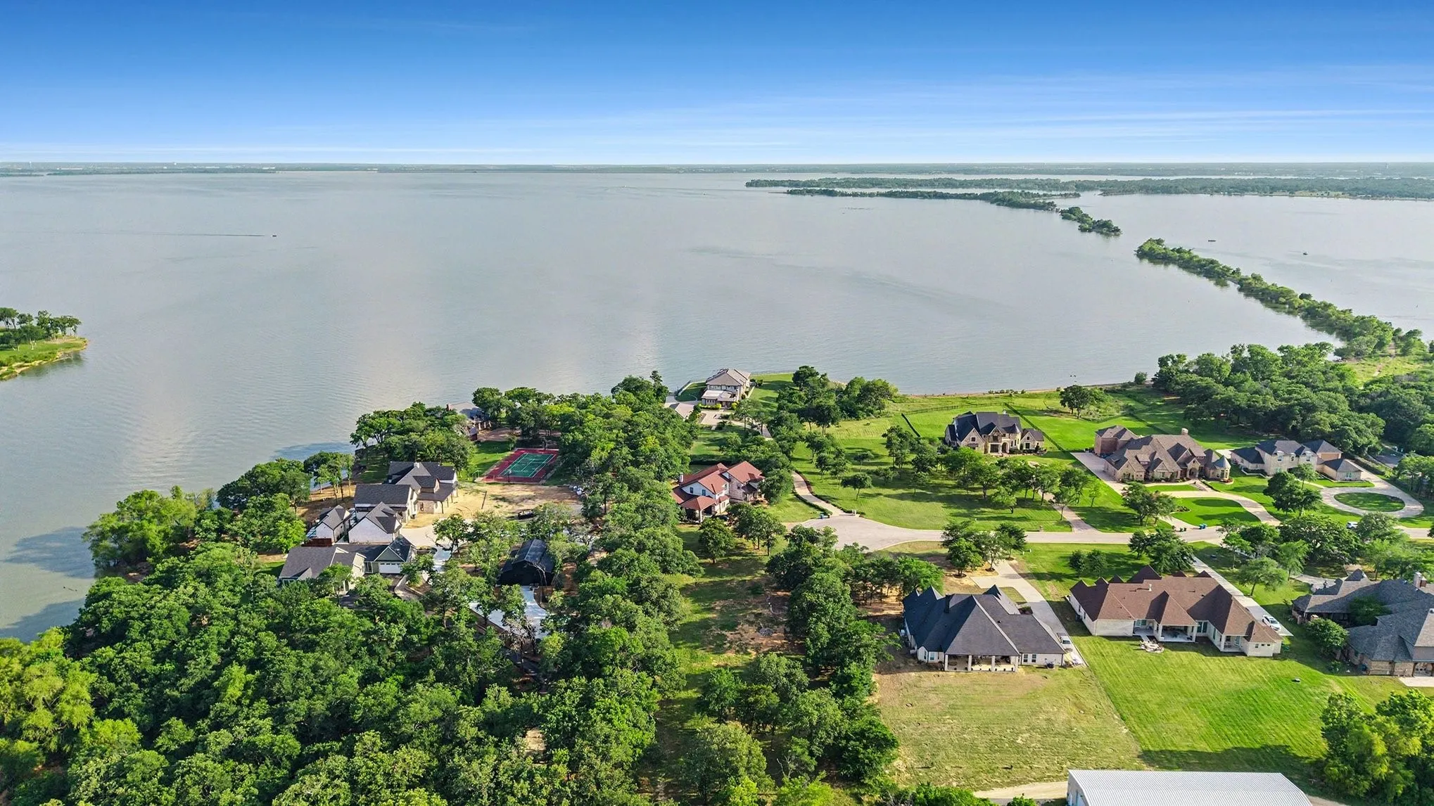 Lake Lewisville aerial with Braewood Bay’s lakefront community nestled among the trees.