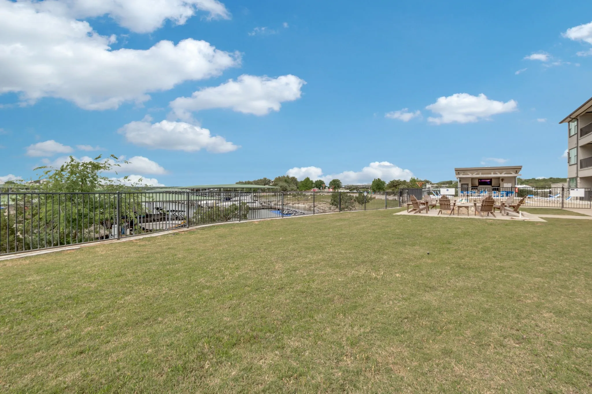 This condo has ample yard space in front of the patio.  Great for games of cornhole.