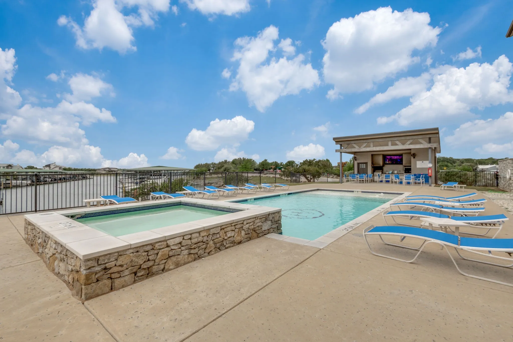 Beautiful pool and hot tub overlooking the lake