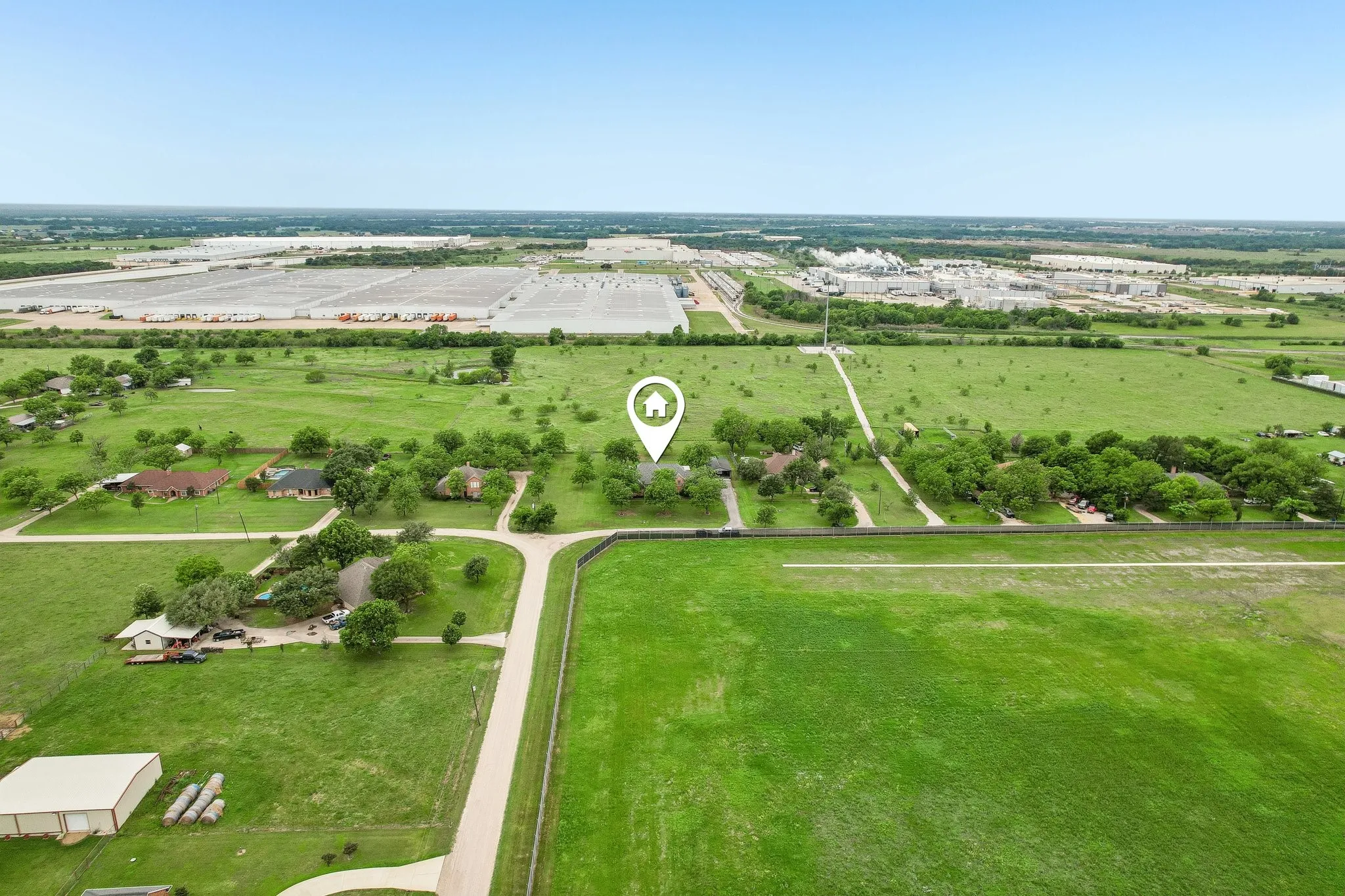 Aerial view highlighting the property boundaries