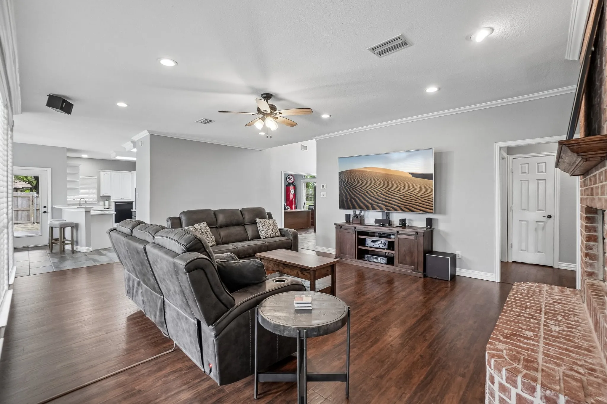 Cozy living room with a beautiful brick fireplace