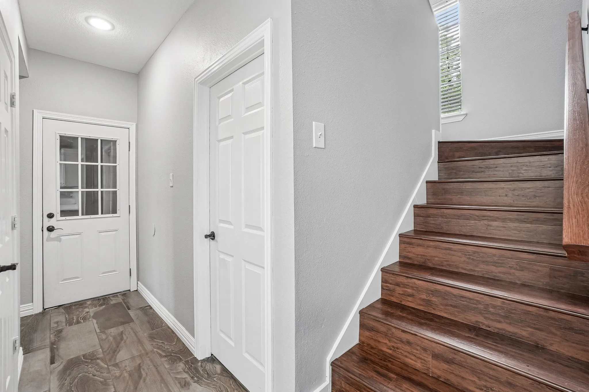Stairs leading to the media room,