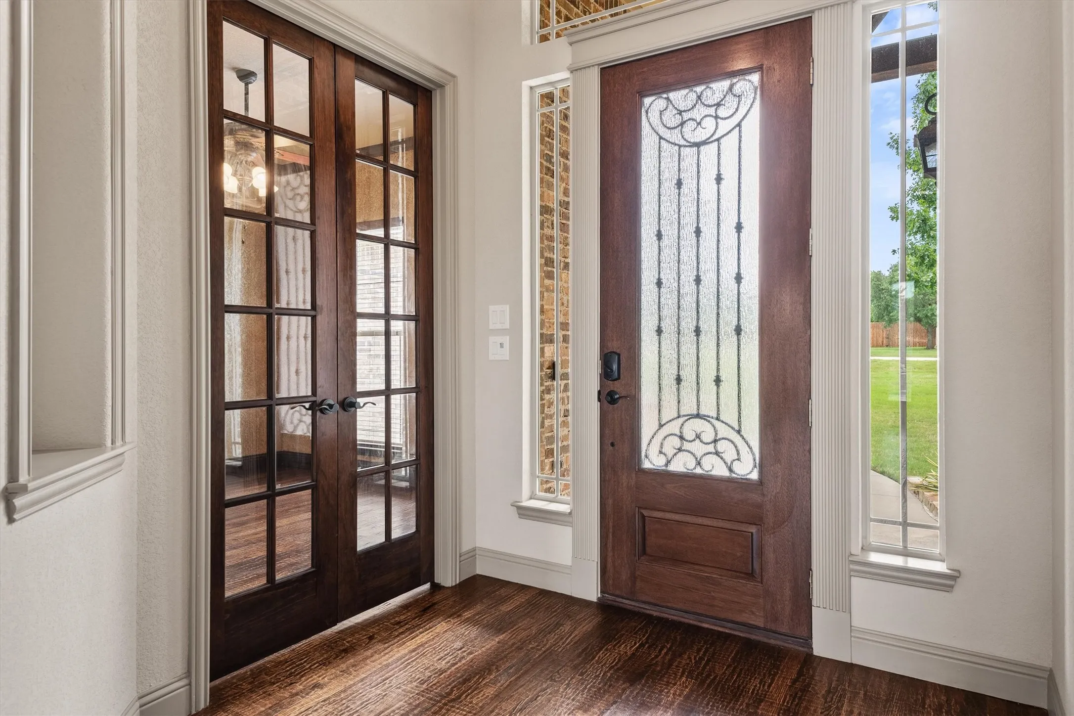 Rich wood-finish flooring in the entryway