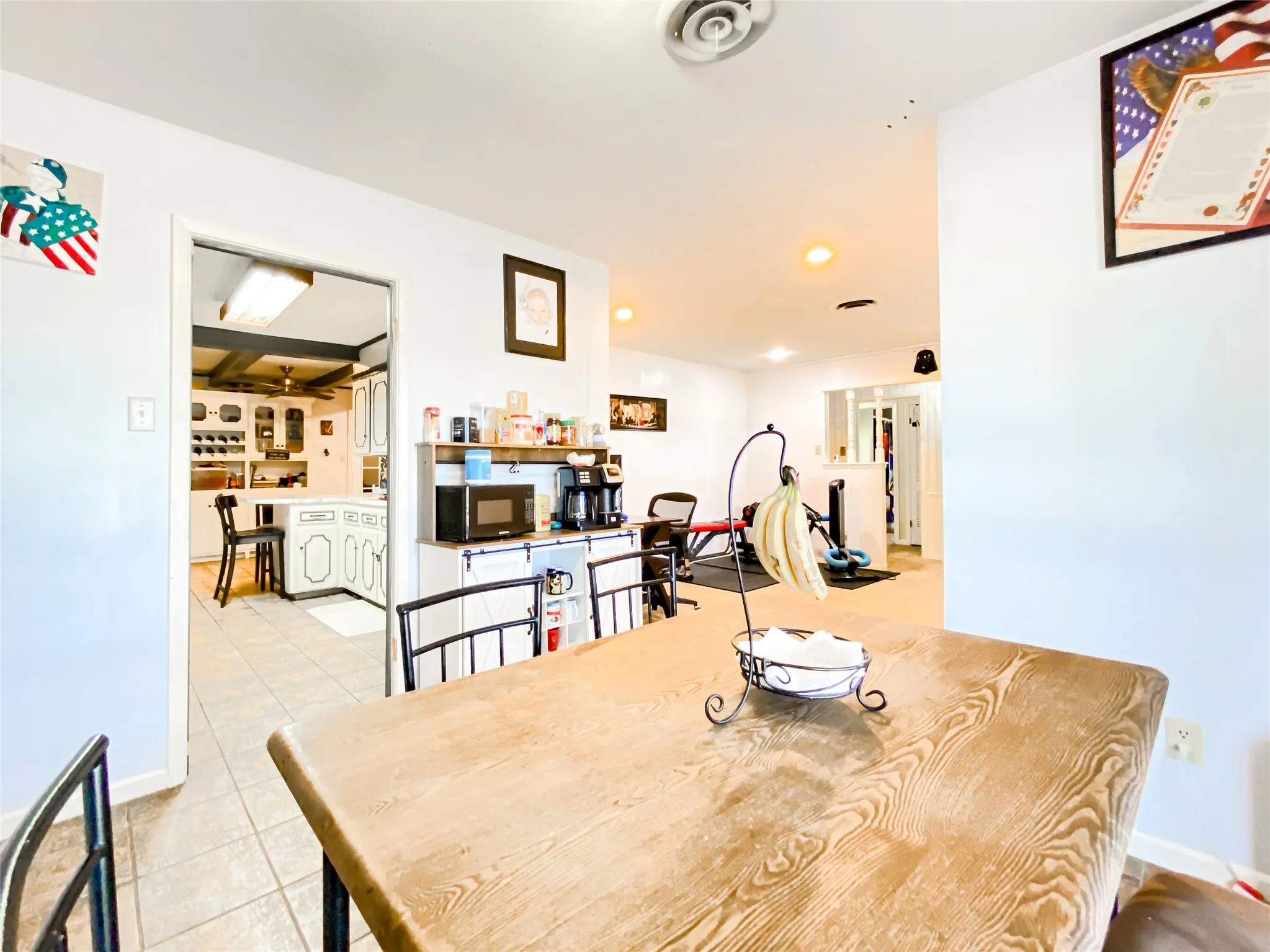 Bright dining area with wood-finish table