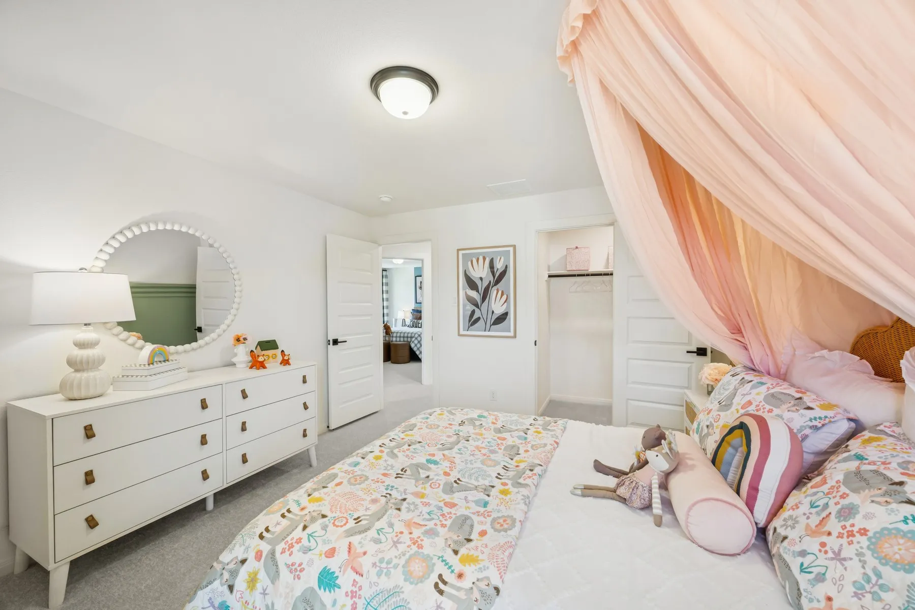 Spacious bedroom featuring light gray carpeting, a closet with a horizontal paneled door, and a flush mount ceiling light
