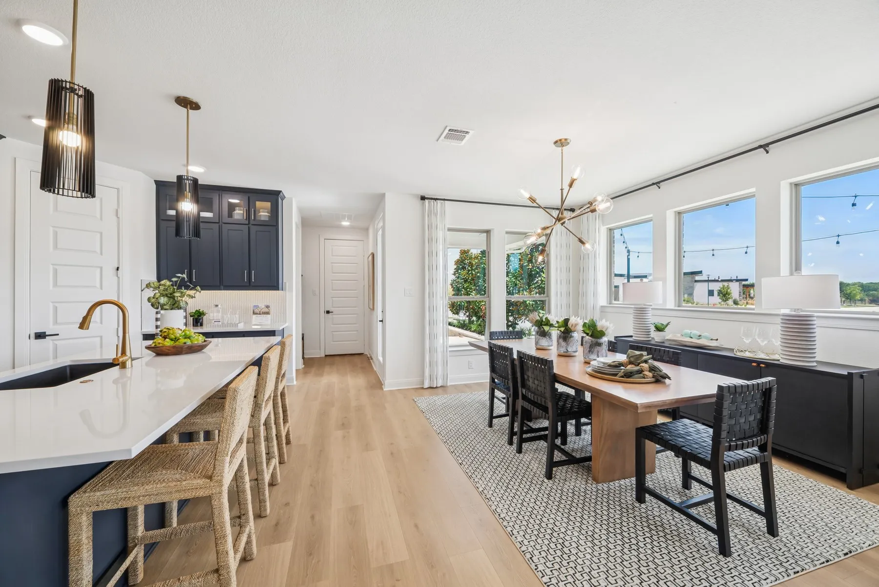 Open-concept living space featuring wood-finish flooring