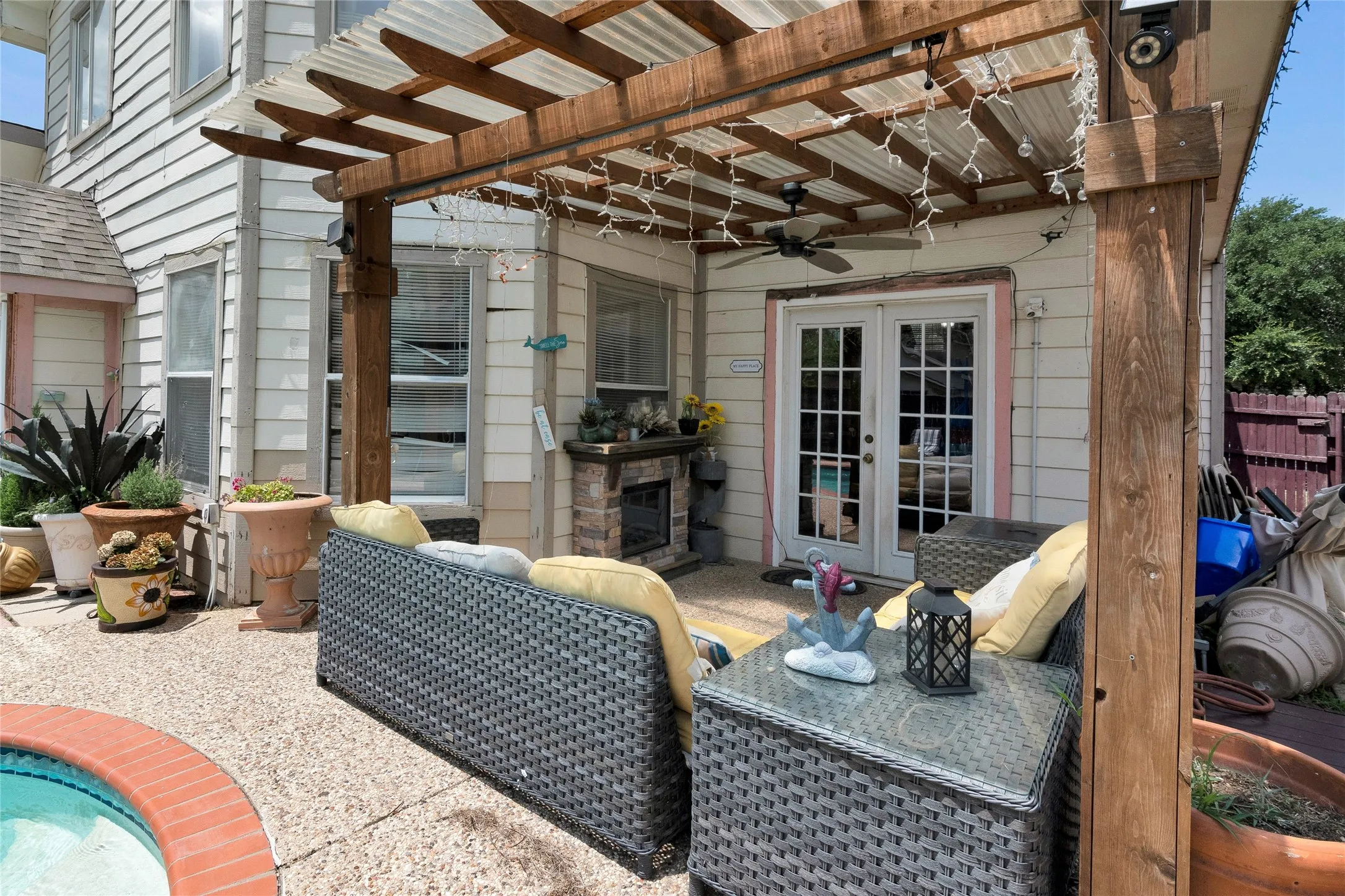 View of patio featuring a pergola, french doors, and ceiling fan
