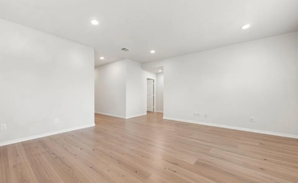 Furniture has been virtually removed.  *this is a rendering from image not actual photo of room*