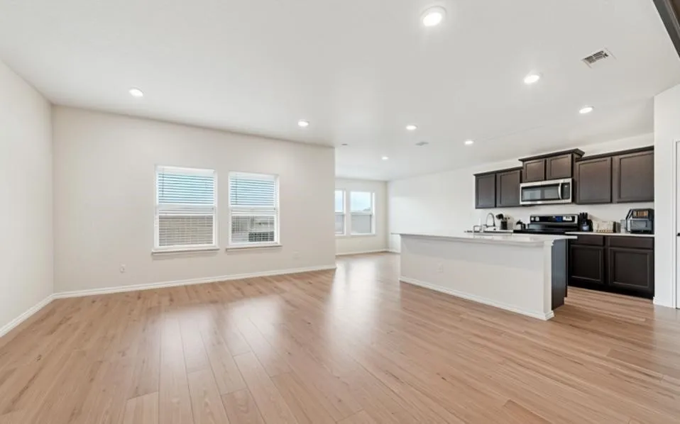 Furniture has been virtually removed.  *this is a rendering from image not actual photo of room*