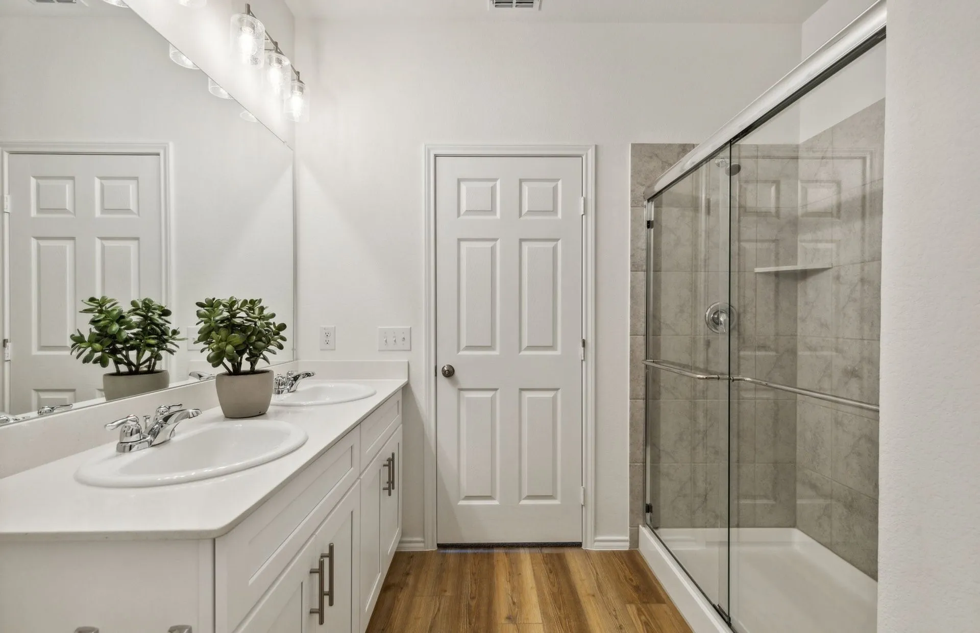 *Model Representation - Owner's private bath with double vanity