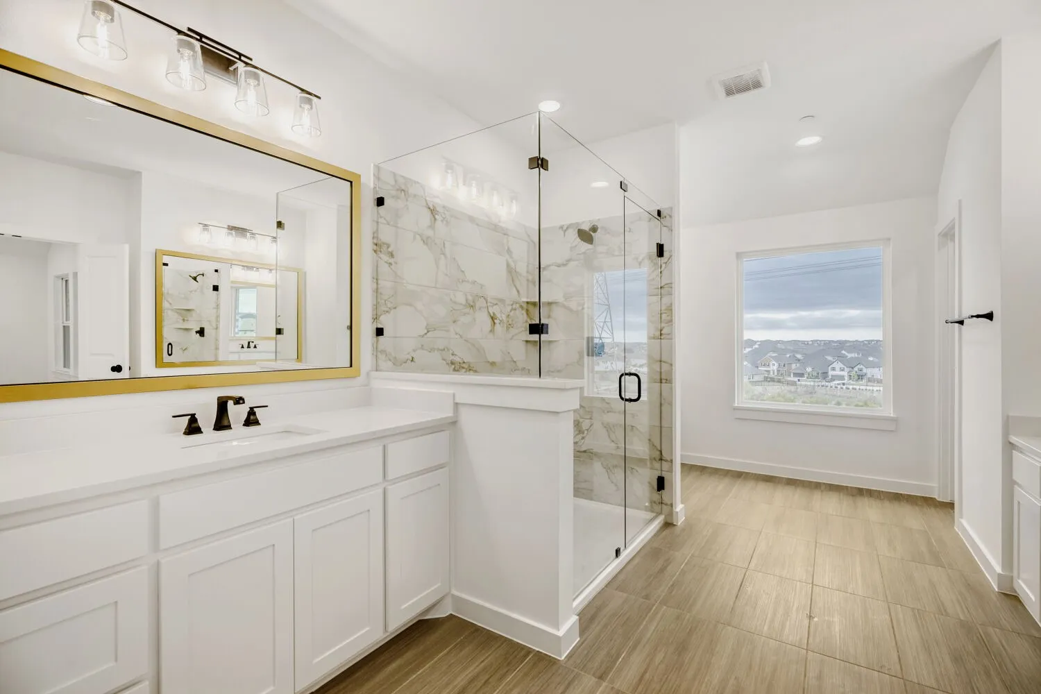 White vanity with dual sinks, quartz countertop, and matte black fixtures